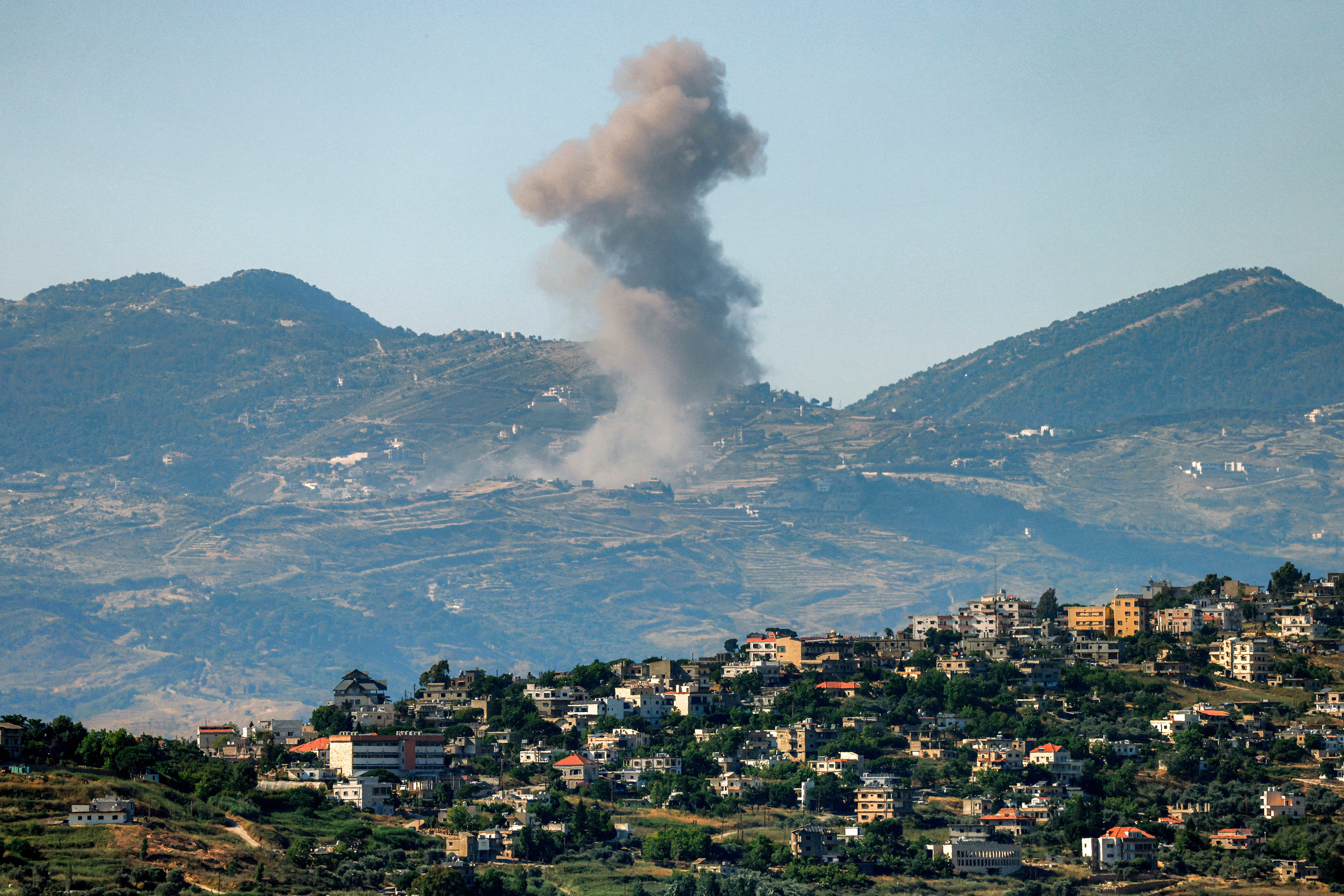 Smoke rises following Israeli bombardment in southern Lebanon as seen from a position across the border in the Upper Galilee in northern Israel on June 19 (AFP/Getty)