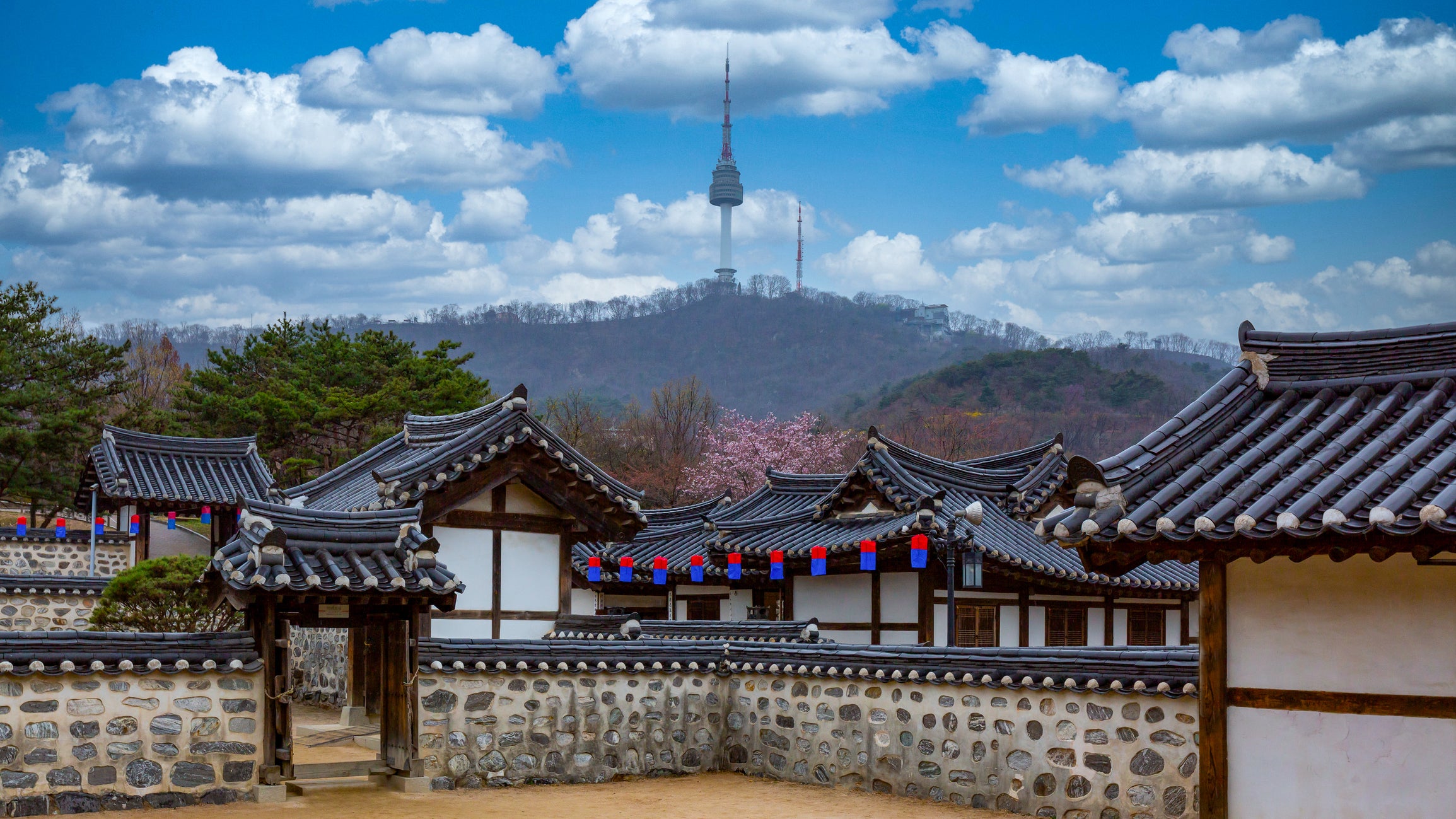 Old meets new: Namsangol Hanok Village and the Seoul Tower in the background