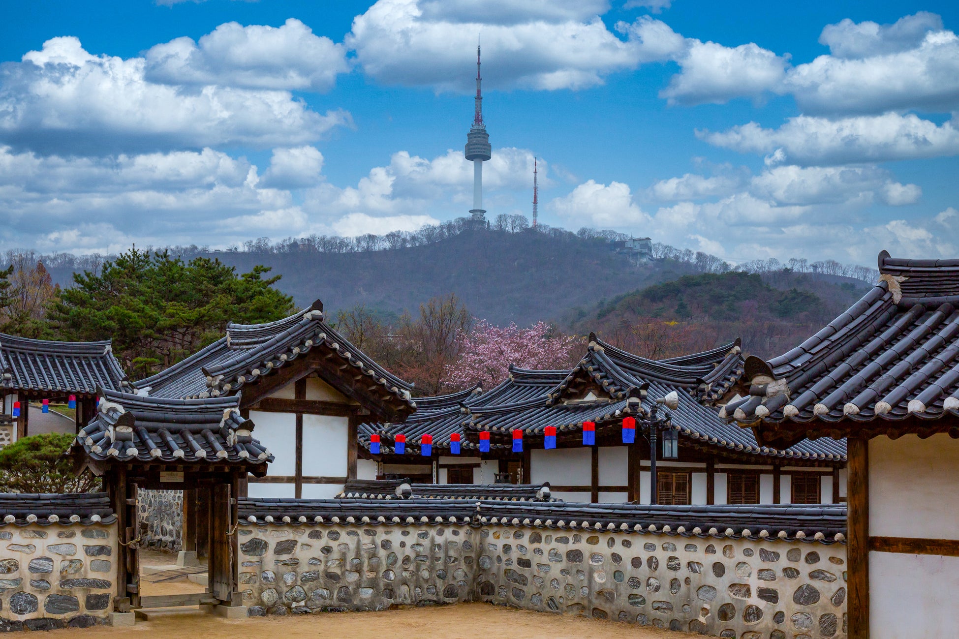 Old meets new: Namsangol Hanok Village and the Seoul Tower in the background (Getty Images/iStockphoto)