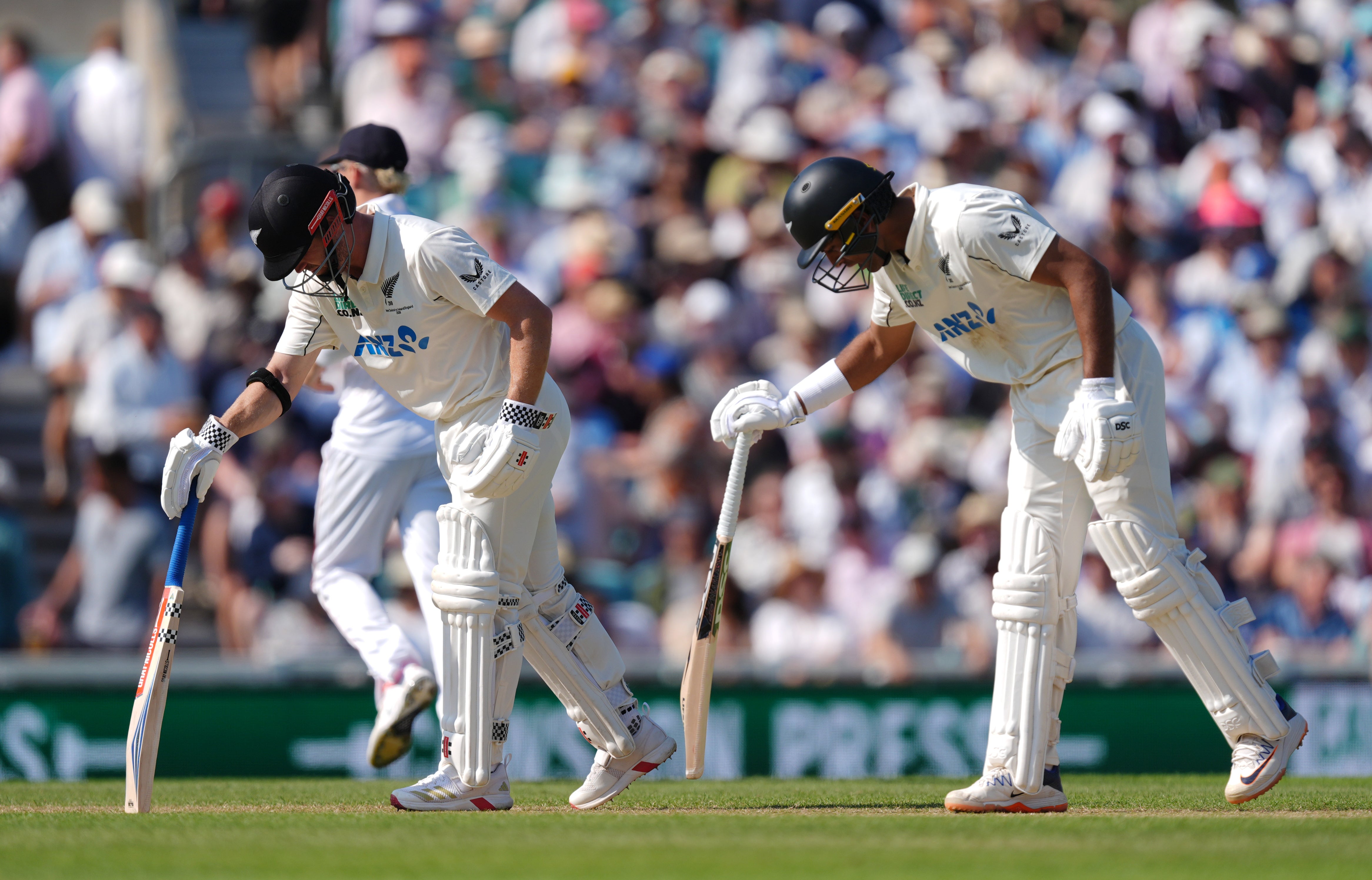 Nicholls (left) and Ravindra underpinned New Zealand’s second innings