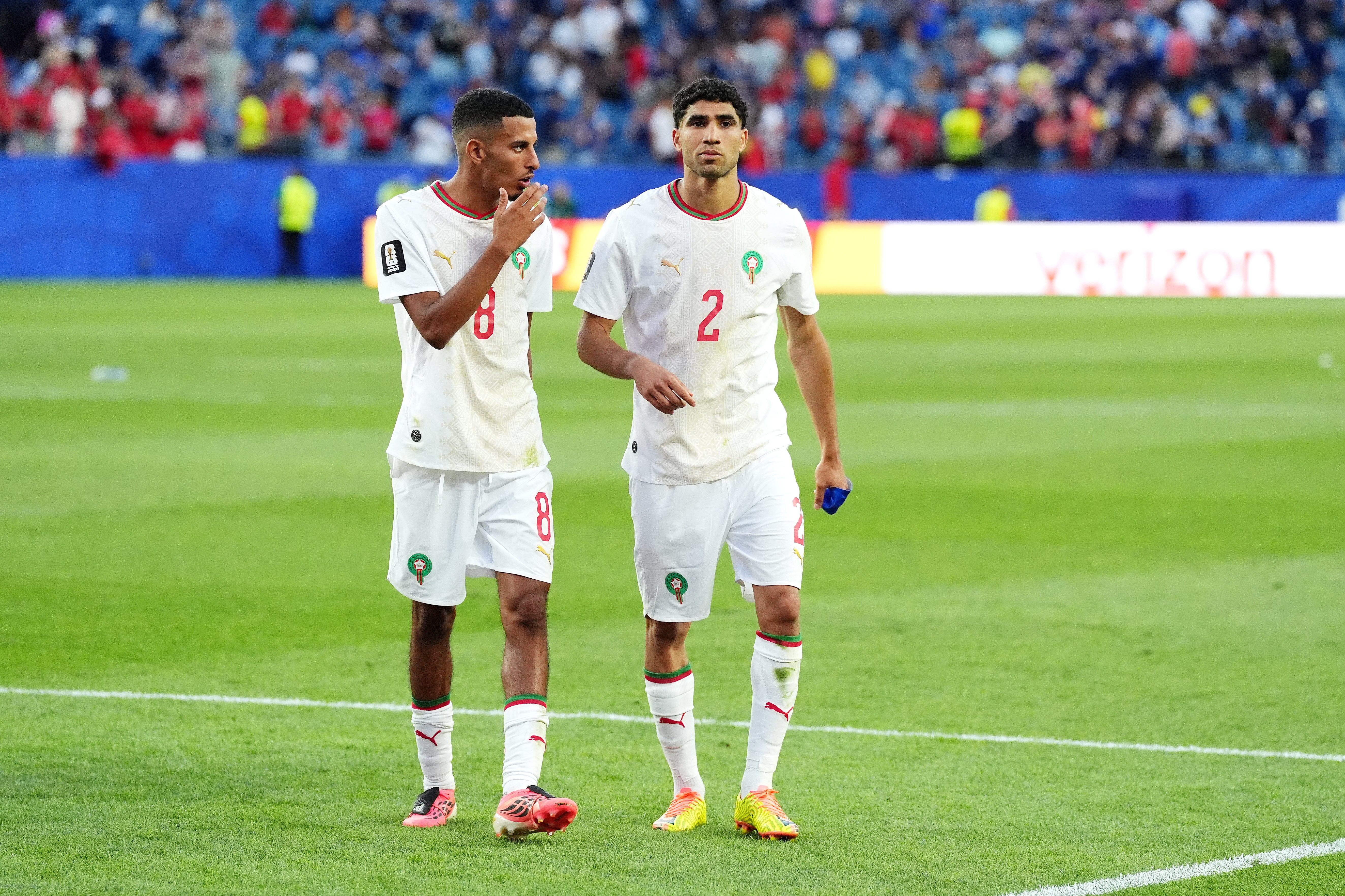 Morocco's Achraf Hakimi (right) and Azzedine Ounahi