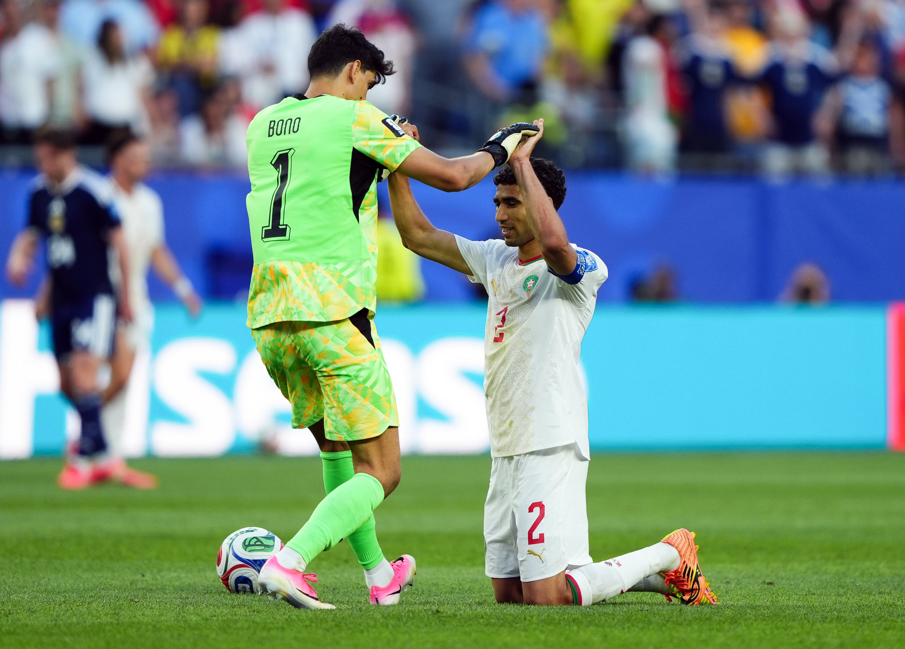 Morocco goalkeeper Yassine Bounou and Achraf Hakimi following the FIFA World Cup Group C match