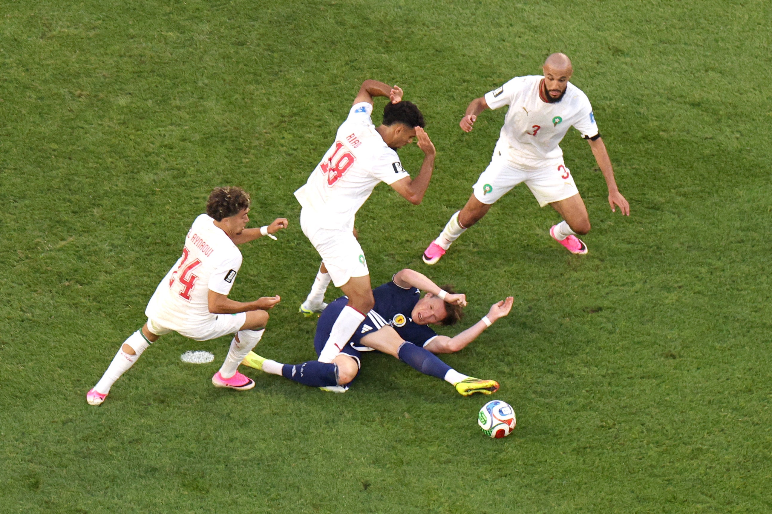 Scott McTominay believed he was fouled by Neil El Aynaoui inside the penalty area but Scotland were not awarded a penalty