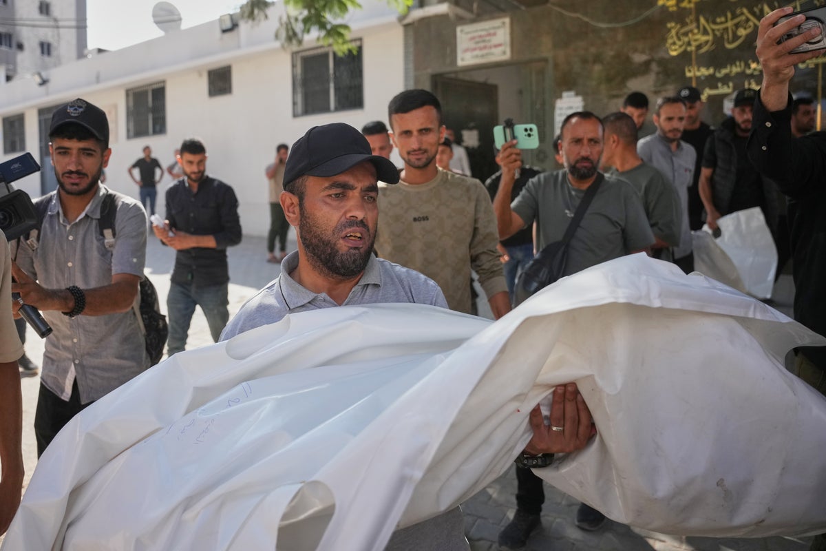 An Israeli strike hits a Gaza City apartment, killing 2 children, Palestinian health officials say An Israeli strike hits a Gaza City apartment, killing 2 children, Palestinian health officials say