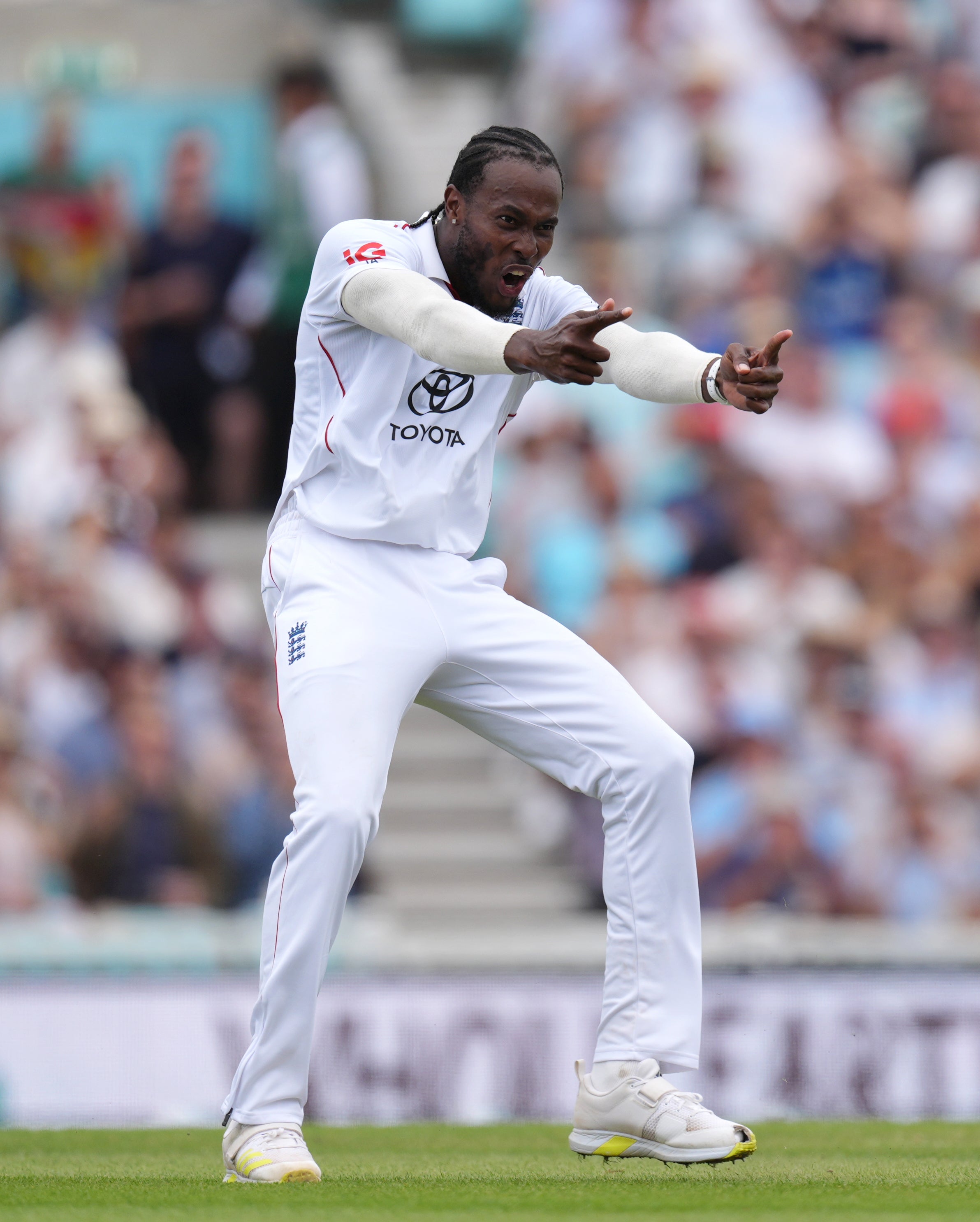 Jofra Archer celebrates the wicket of Glenn Phillips (Ben Whitley/PA)