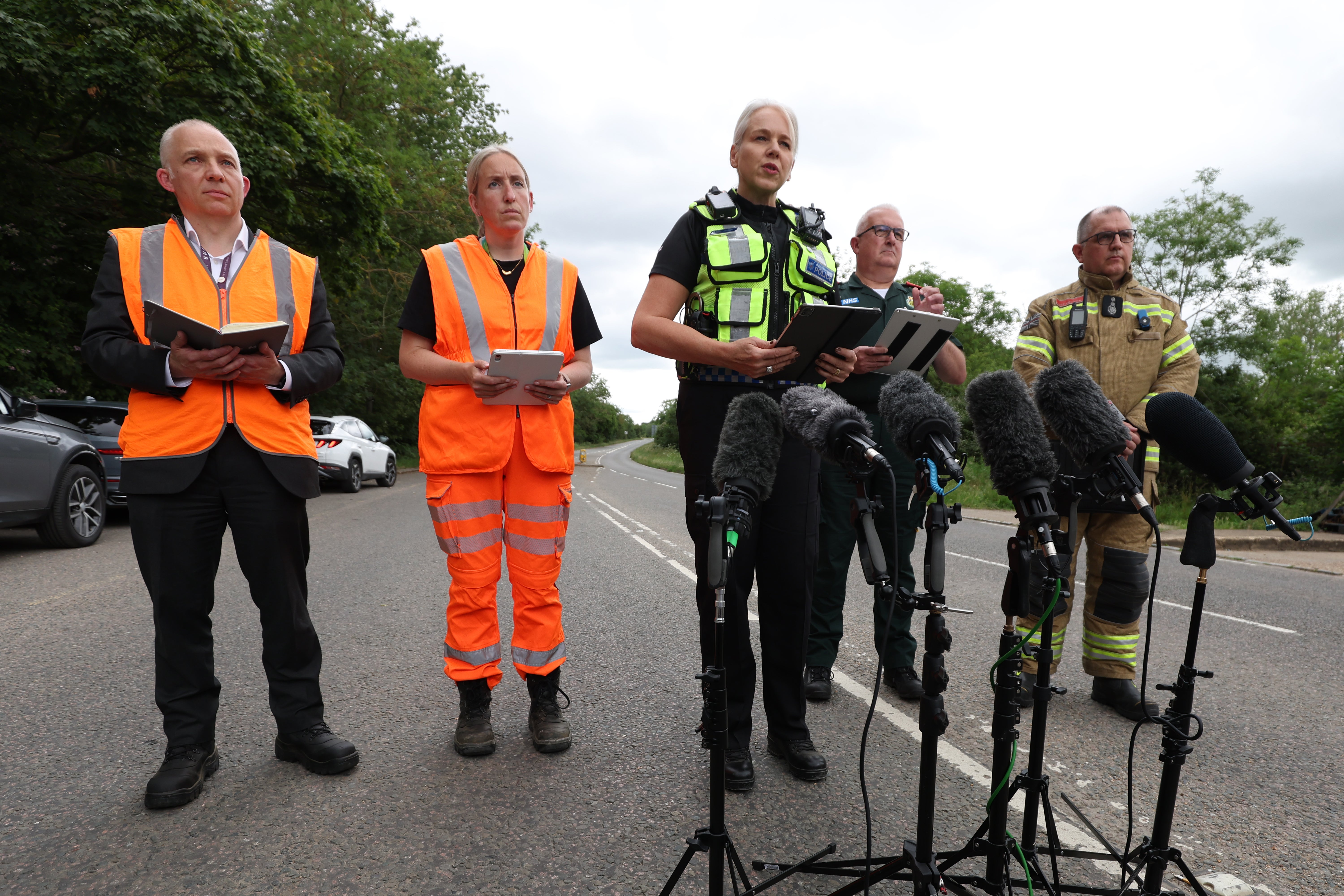 British Transport Police Chief Constable Lucy D'Orsi (centre) spoke to members of the media near the scene on Saturday afternoon