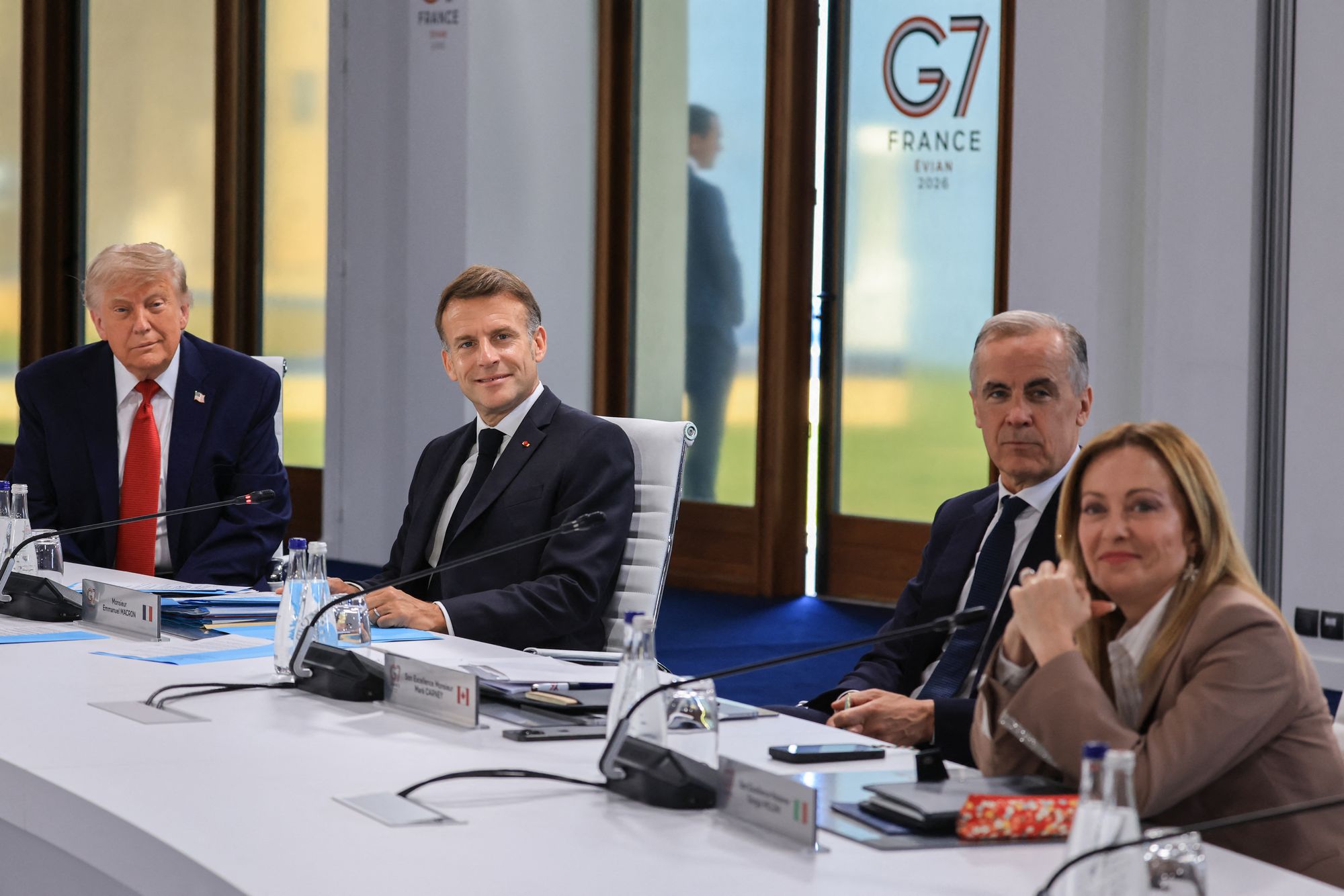 'She begged me for a picture! She wanted a picture with me so badly,' Trump reportedly told an Italian journalist. Pictured here, Trump and Meloni sit alongside French President Emmanuel Macron and Canadian Prime Minister Mark Carney at the G7 Summit