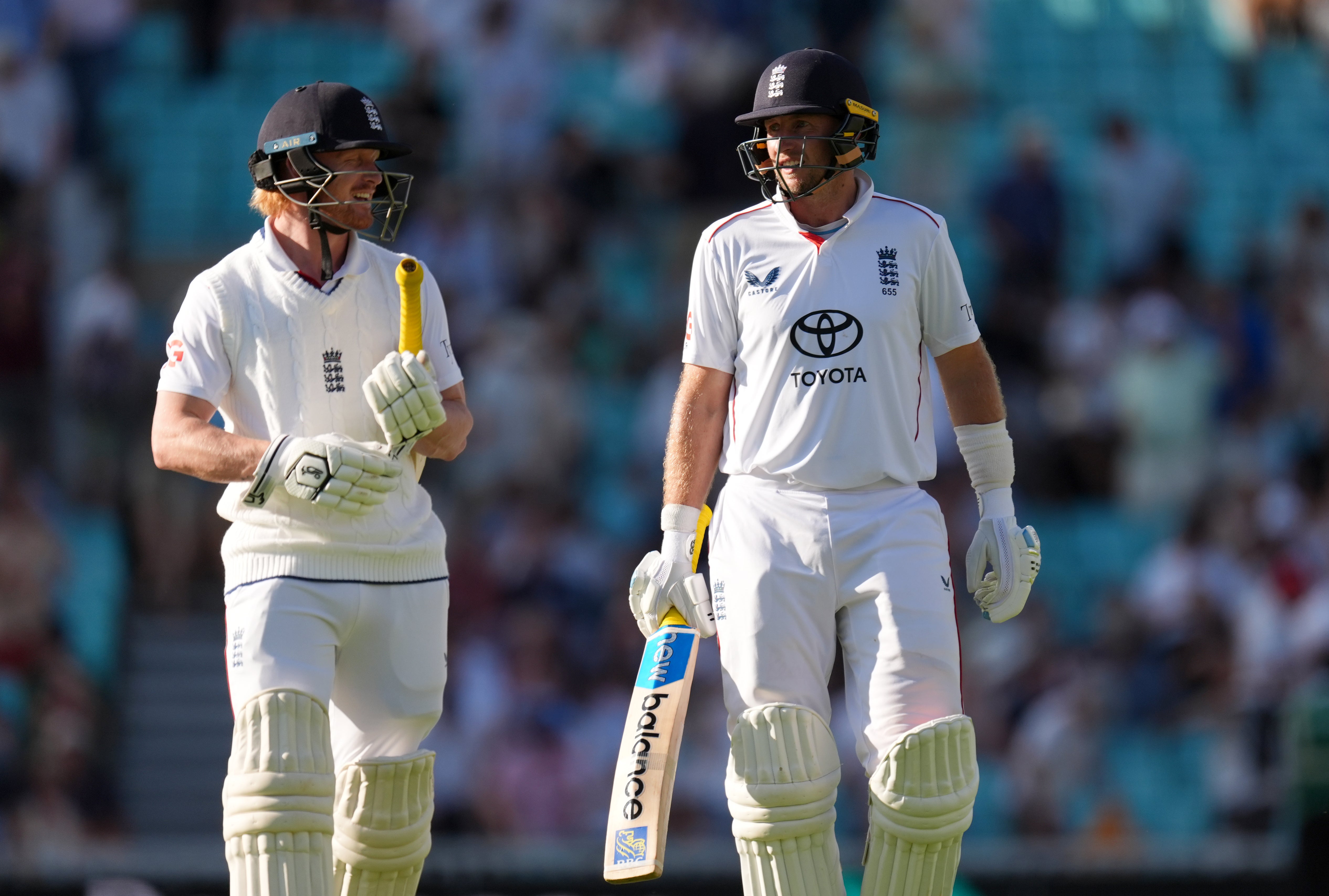England’s Jordan Cox, left, and Joe Root leave the field at the close of play (Ben Whitley/PA)
