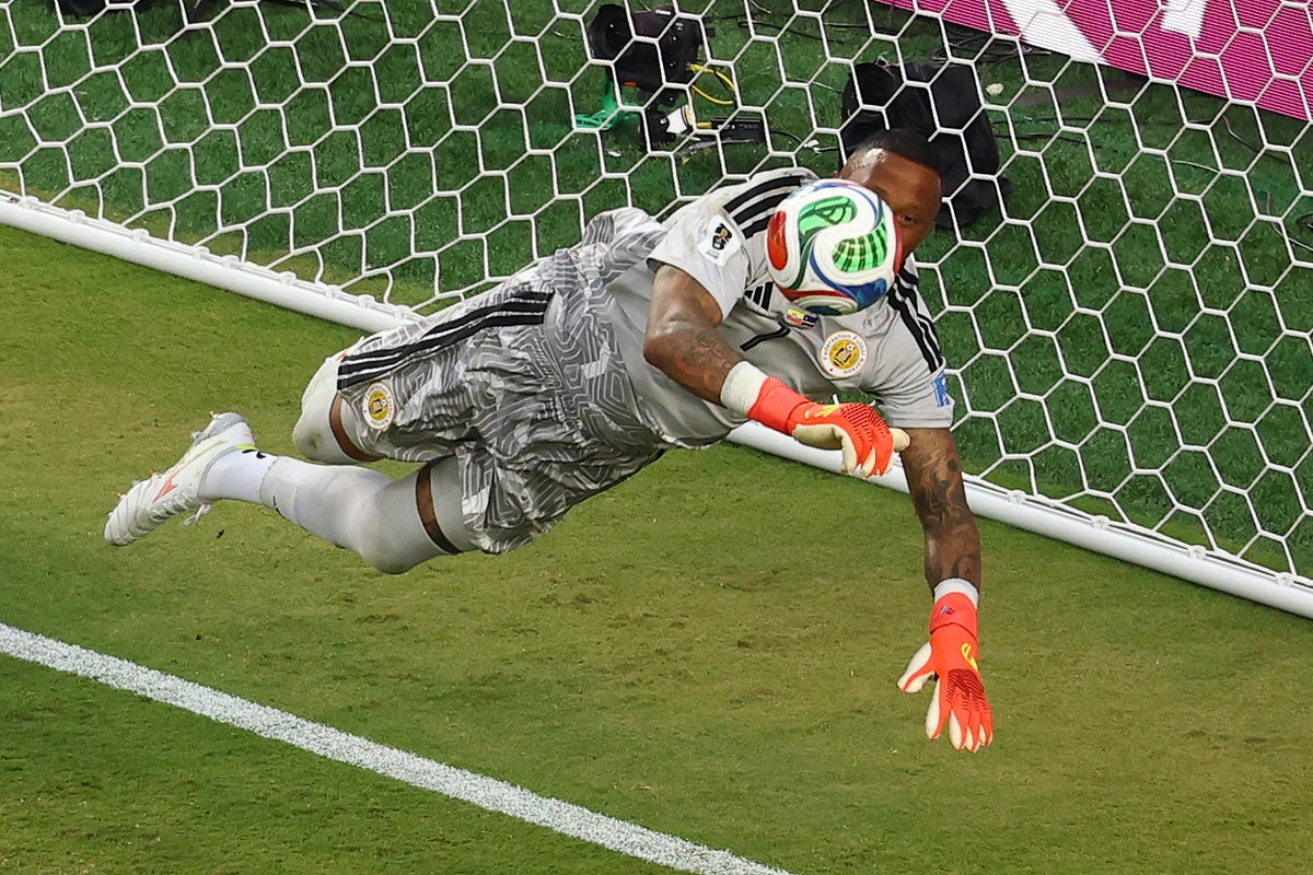 Curacao gains first-ever World Cup point after 15 Eloy Room saves