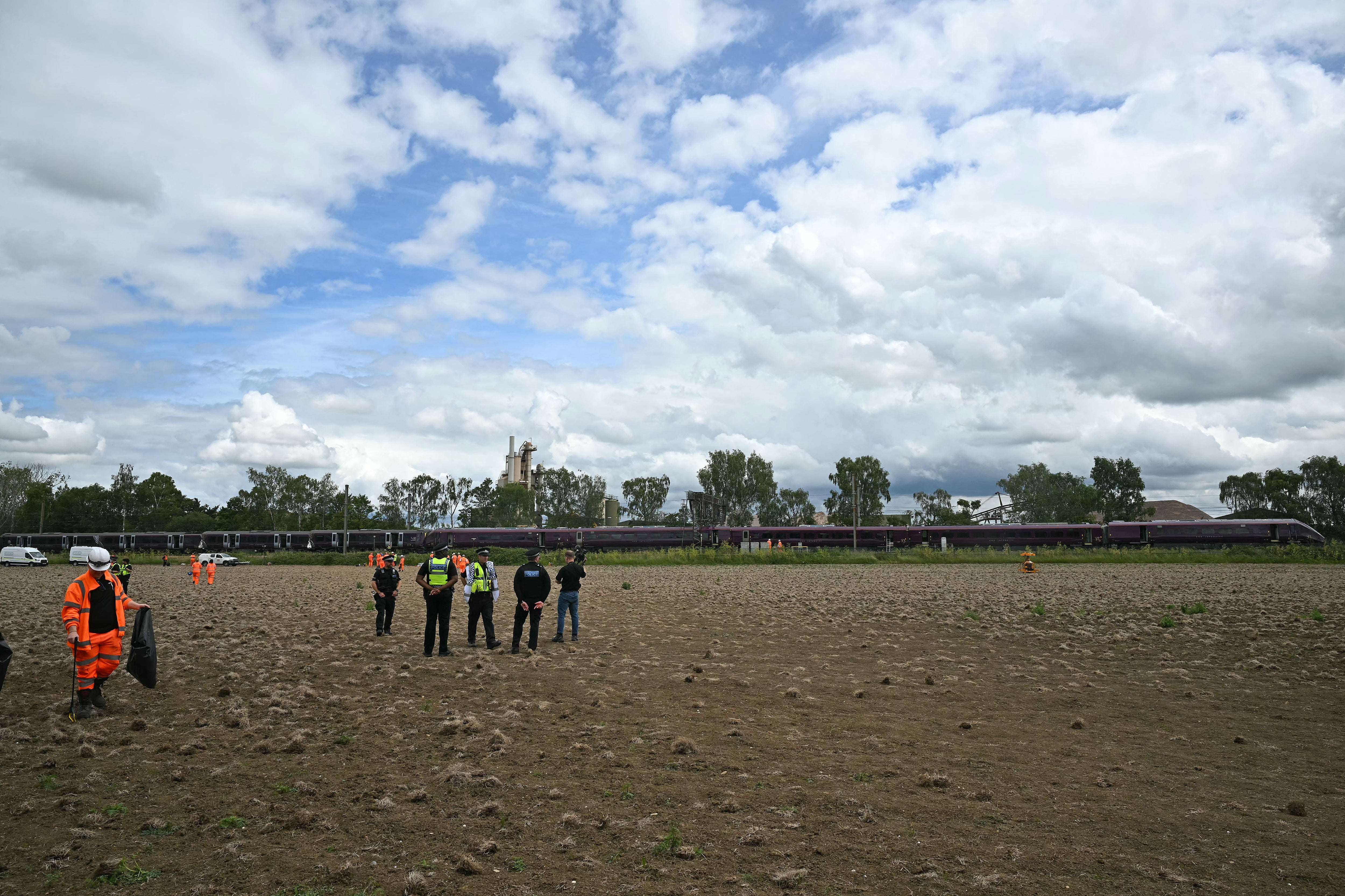 Journalists and photographers were allowed to enter a nearby field on Saturday afternoon (AFP/Getty)