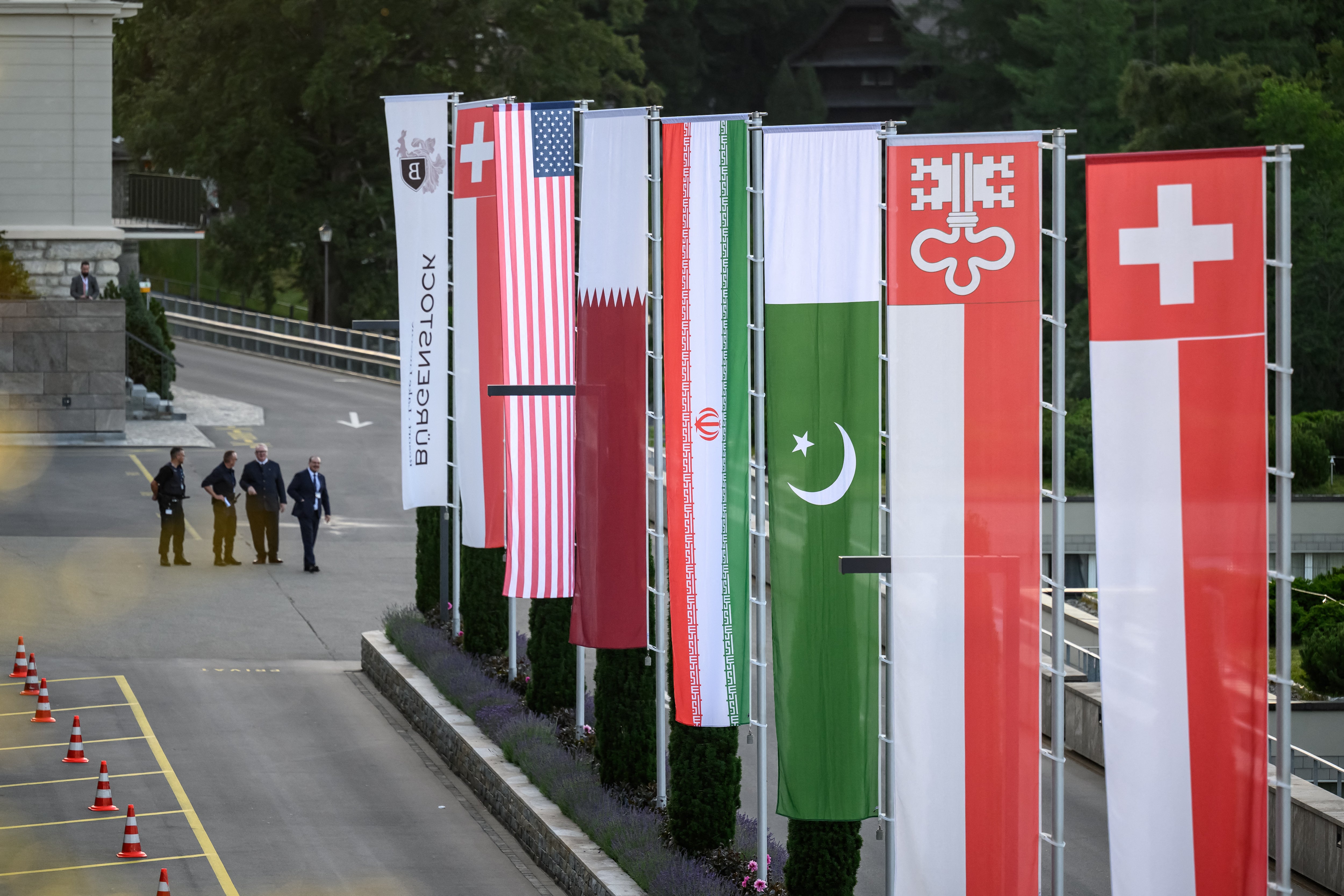 Flags of Switzerland, United States, Qatar, Pakistan and local Swiss canton of Nidwalden are photographed at the Burgenstock luxury hotel complex overlooking Lake Lucerne (AFP/Getty)