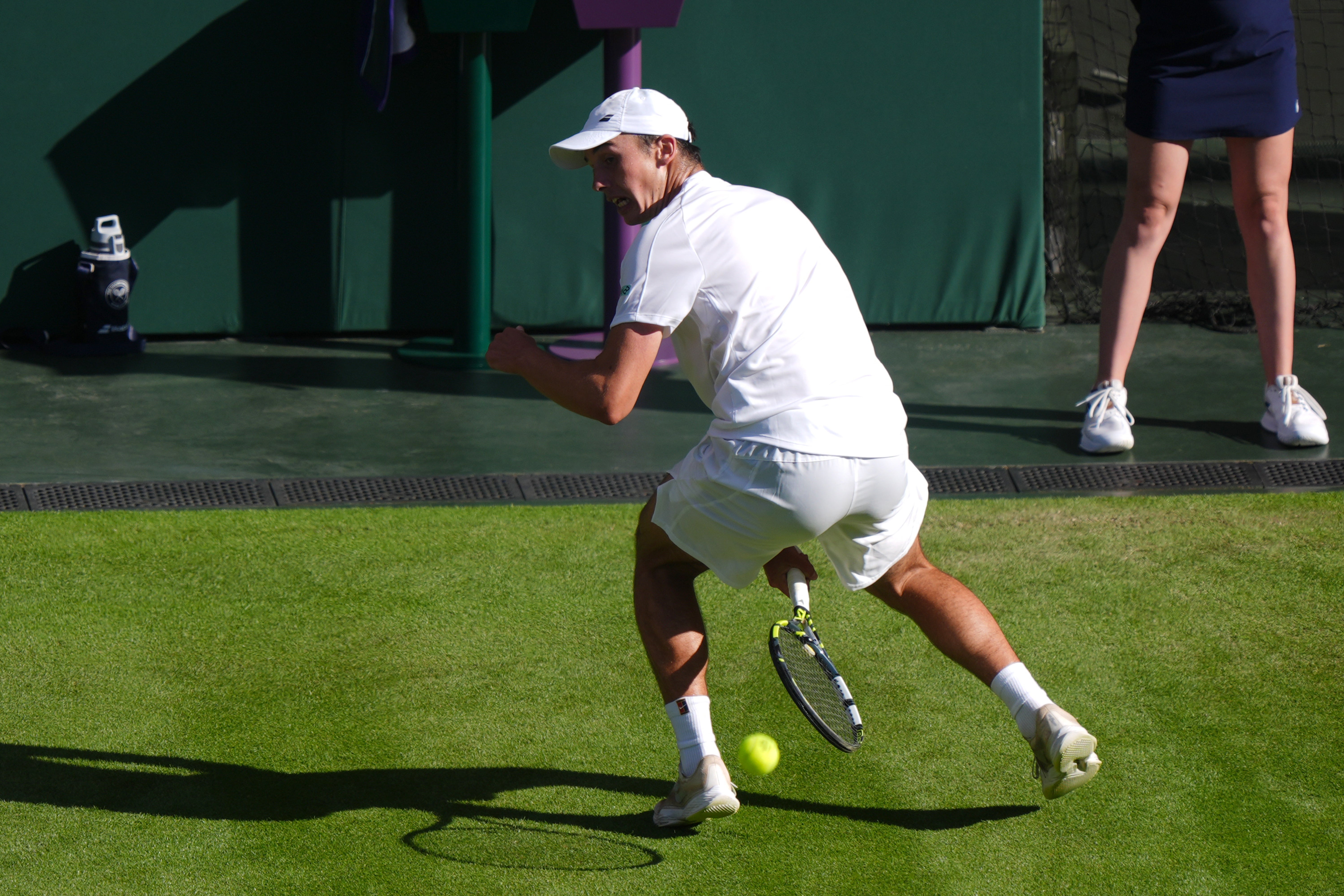 Oliver Tarvet plays a tweener at Wimbledon (Ben Whitley/PA)