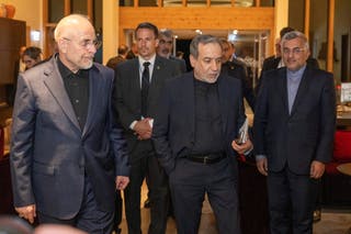 Minister of Foreign Affairs of Iran, Seyyed Abbas Araghchi, centre, and Speaker of the Islamic Parliament of Iran, Mohammad Bagher Ghalibaf, left, at the Buergenstock resort in Obbuergen, near Lucerne, Switzerland, Sunday, June 20, 2026