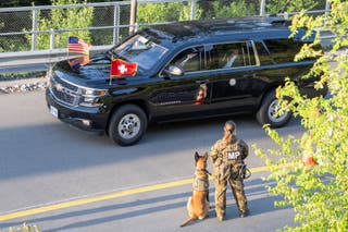 A vehicle of the convoy with US-Vice-President JD Vance arrives at the Buergenstock resort in Obbuergen, near Lucerne, Switzerland, Sunday, June 21, 2026.