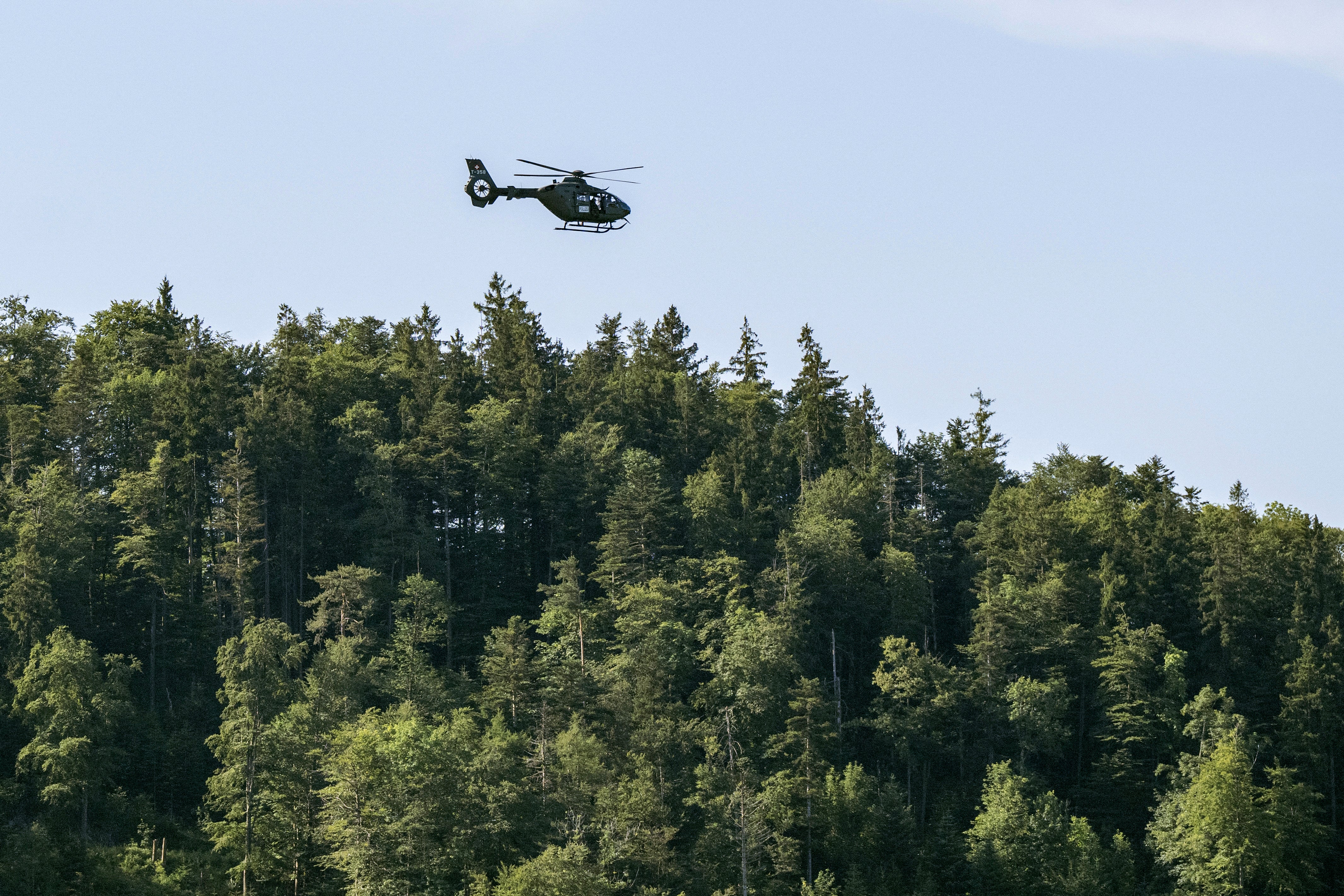 A Swiss Army helicpoter flies over the Buergenstock resort, near Lucerne, Switzerland, on June 21, 2026 ahead of high-level talks aimed at advancing a deal to end the Middle East conflict (AFP/Getty)