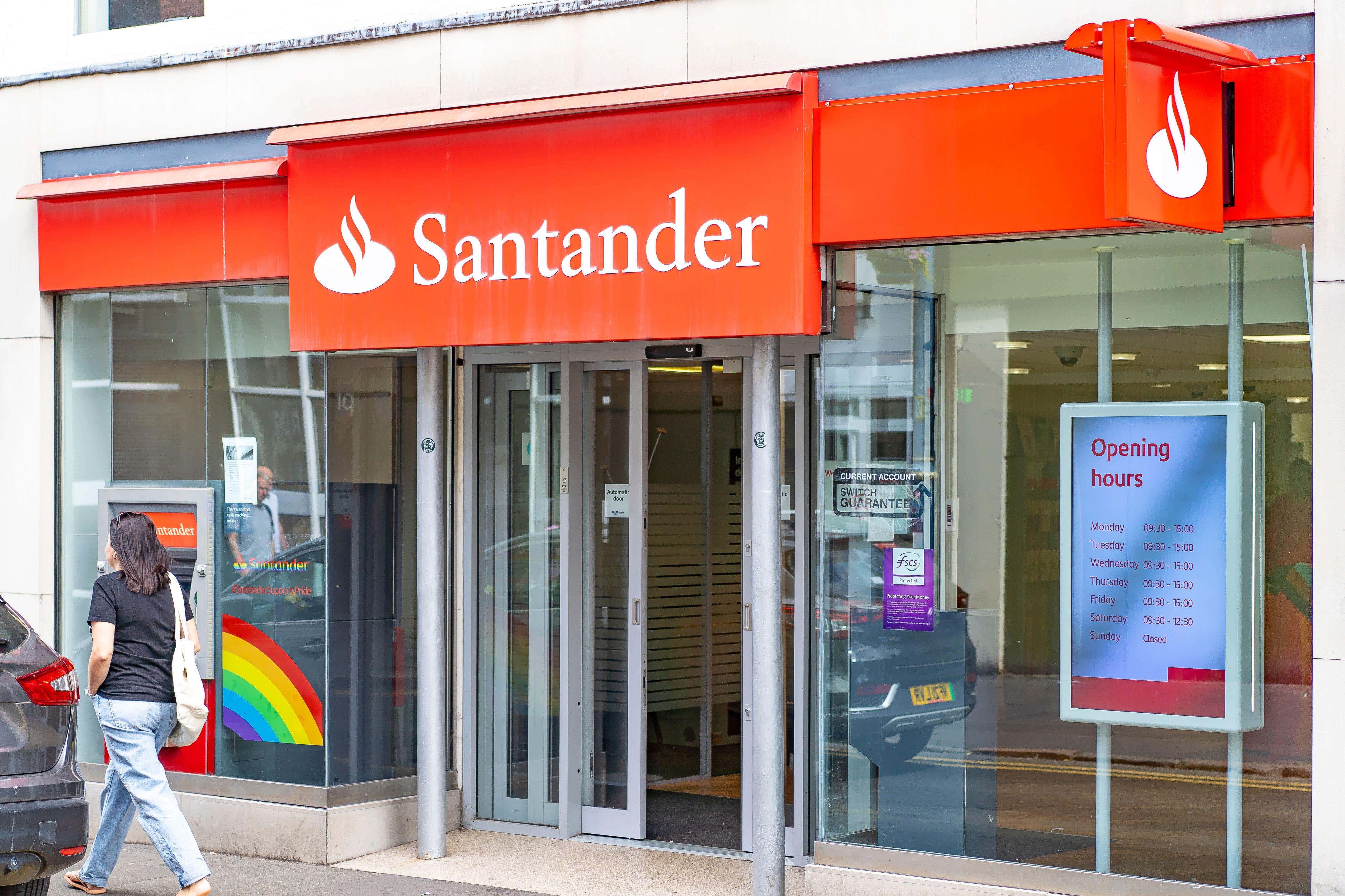 The Spanish owner of Santander UK has revealed aims to cut costs by more than 500 million euros (£433 million) by accelerating the use of artificial intelligence (AI) across its global operations. (Alamy/PA)