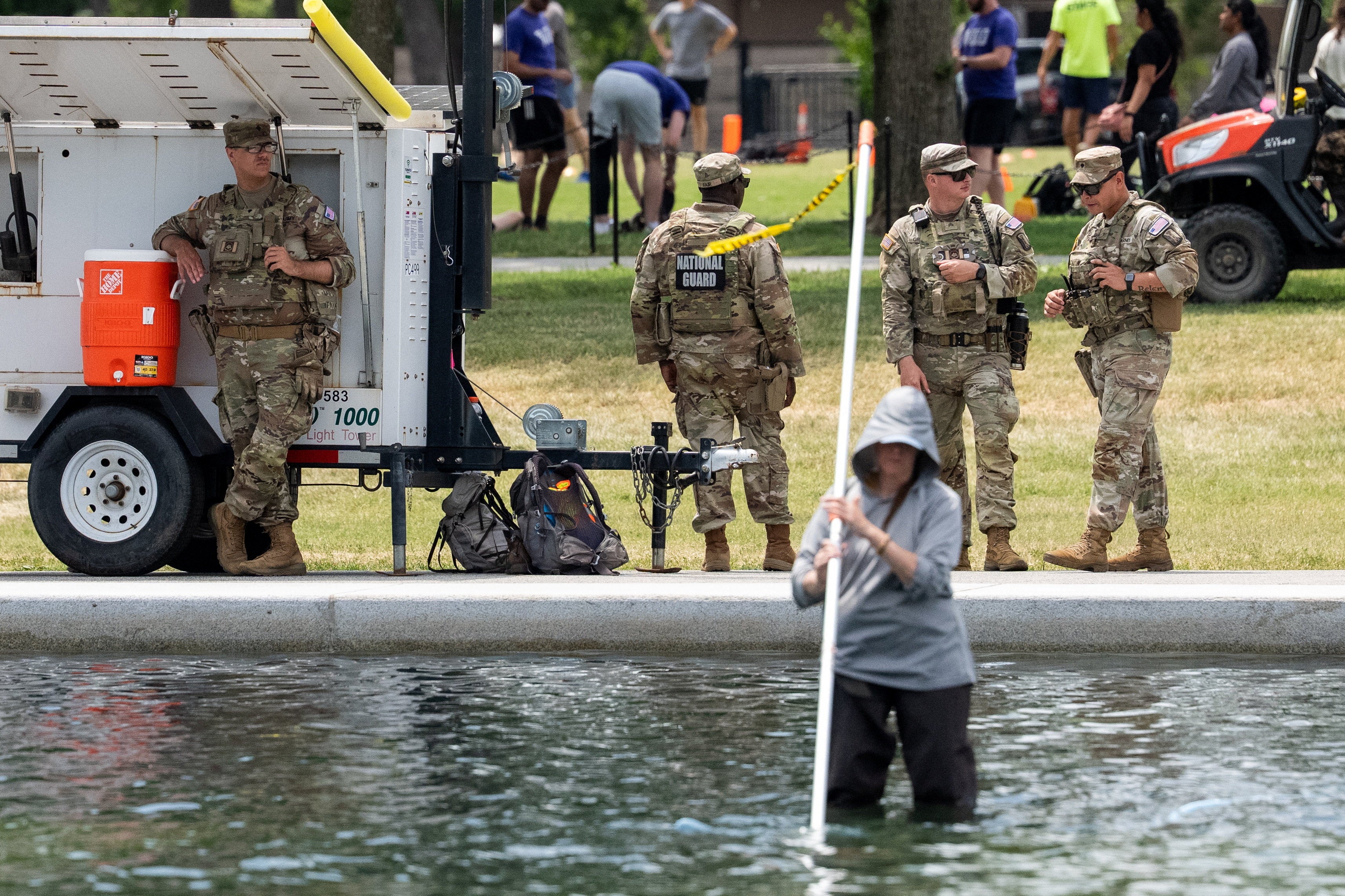 A dead duckling was found in the Lincoln Memorial Reflecting Pool, where repair work continues under watch by the National Guard