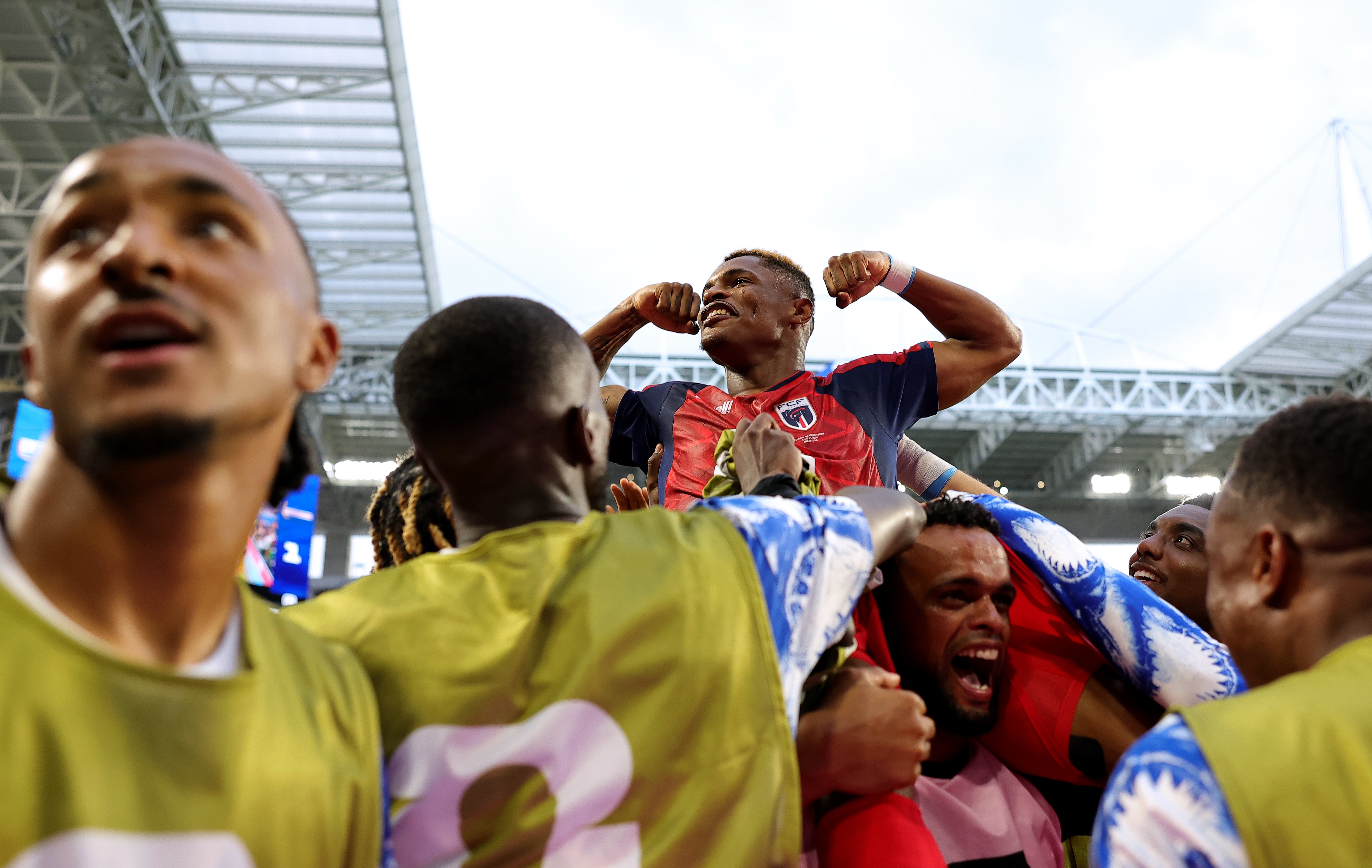 Helio Varela is mobbed by teammates after scoring for Cape Verde