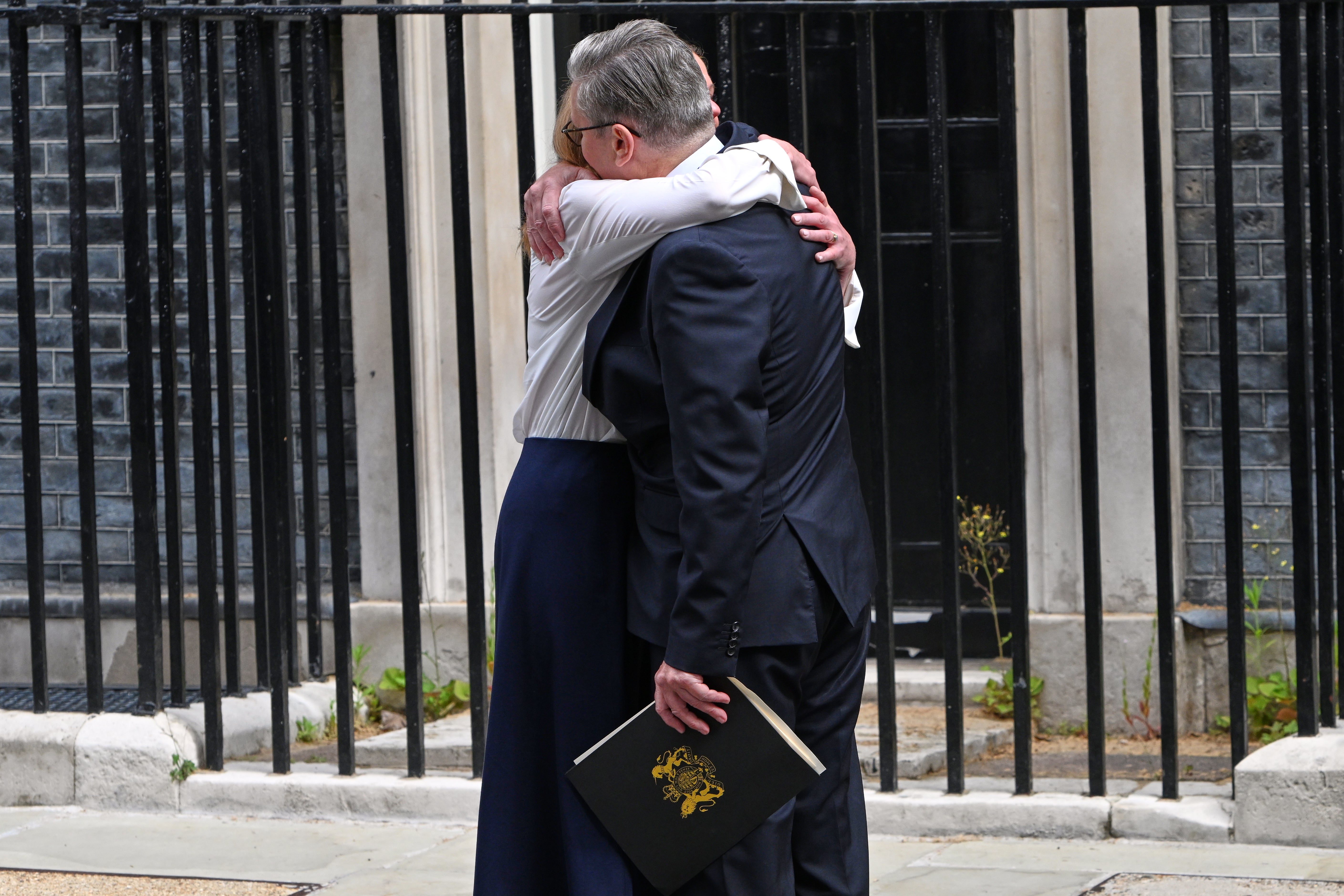 Starmer hugs his wife Victoria after he announced his resignation