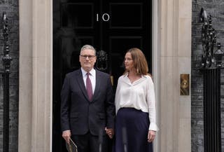 Prime Minister Sir Keir Starmer and his wife Lady Victoria Starmer on the steps of 10 Downing Street, London (Andrew Matthews/PA)