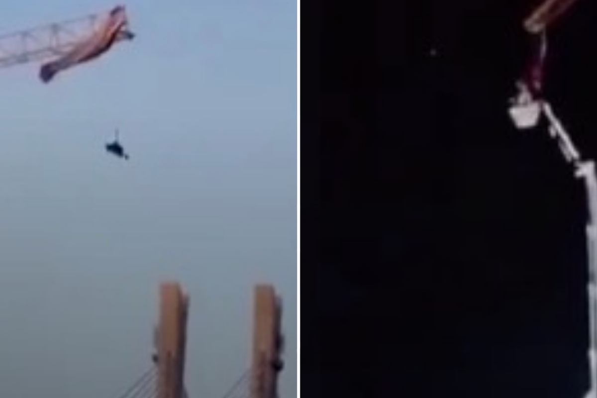 Paraglider rescued after becoming entangled on crane during jump in China