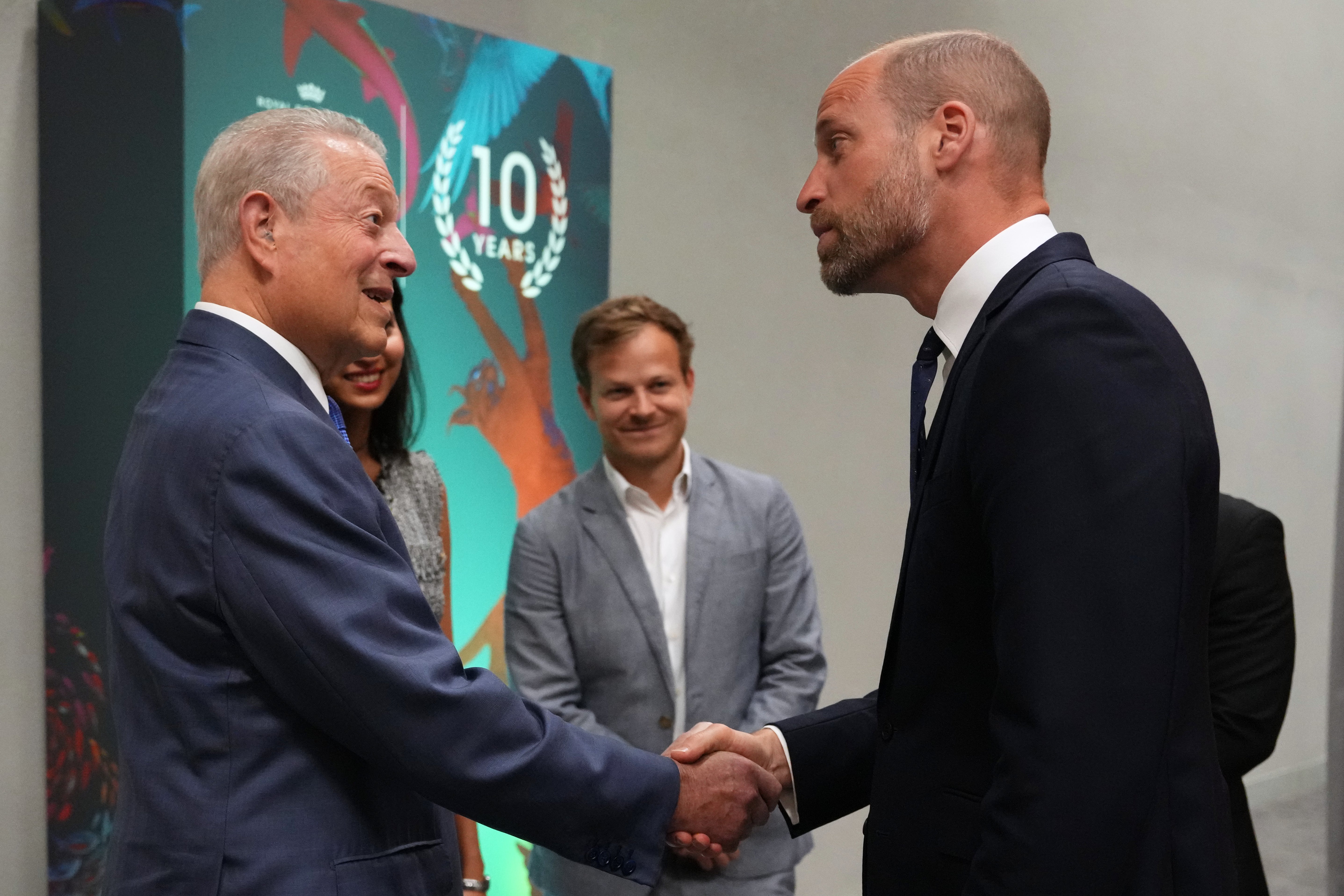 The Prince of Wales shook hands with former US vice president Al Gore at the forum (Kirsty Wigglesworth/PA)