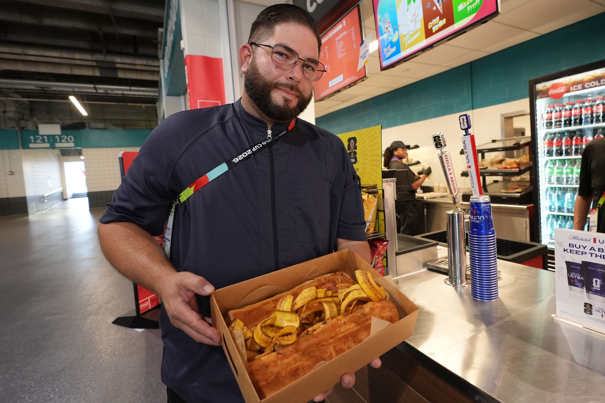 Lazaro Luya, the concession chef at Sol Cubano, displays their special, pan with lechon and fresh mariquitas at Miami Stadium Sunday, June 21, 2026, in Miami Gardens, Fla. (AP)
