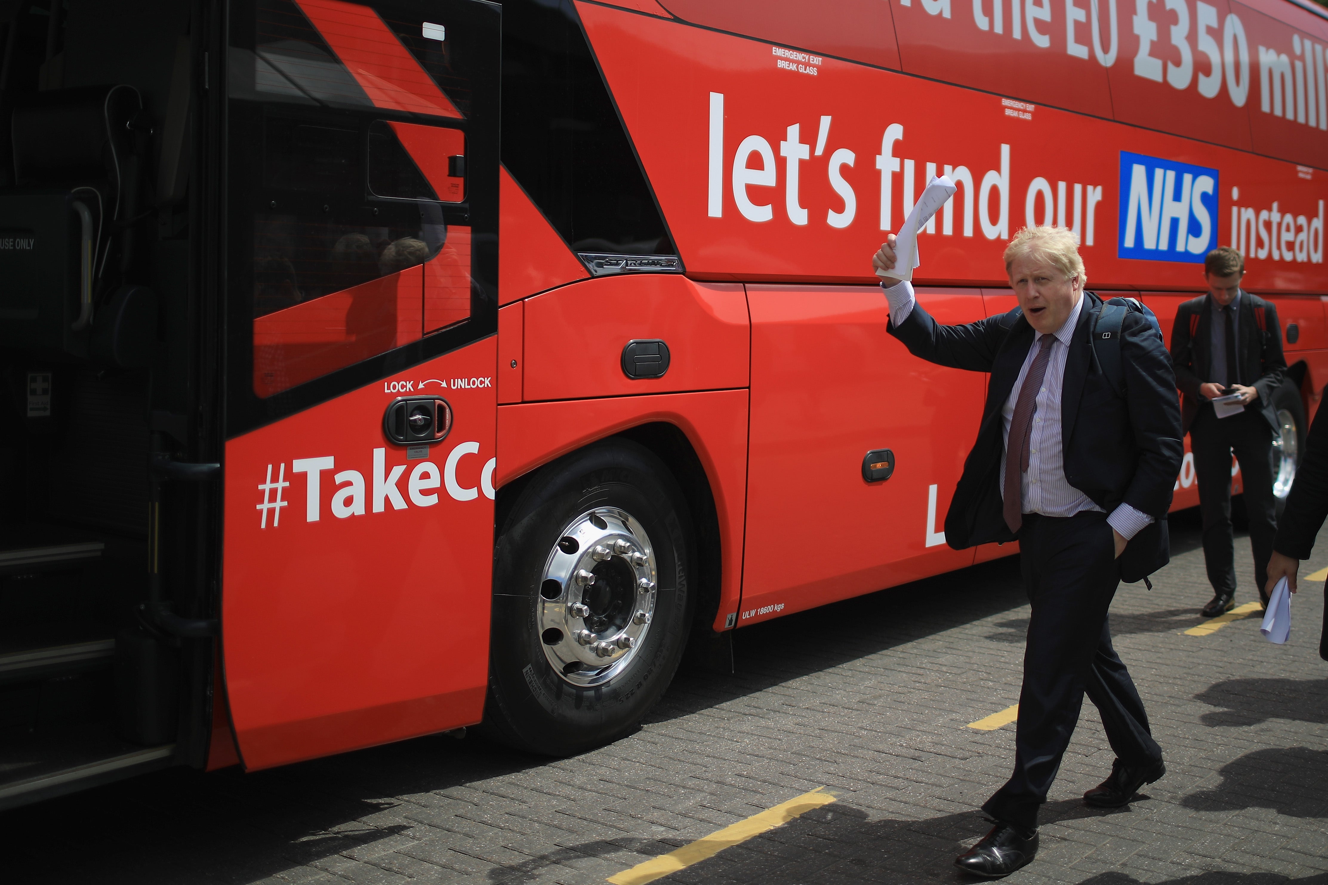 Boris Johnson alongside the infamous Brexit bus (Getty)