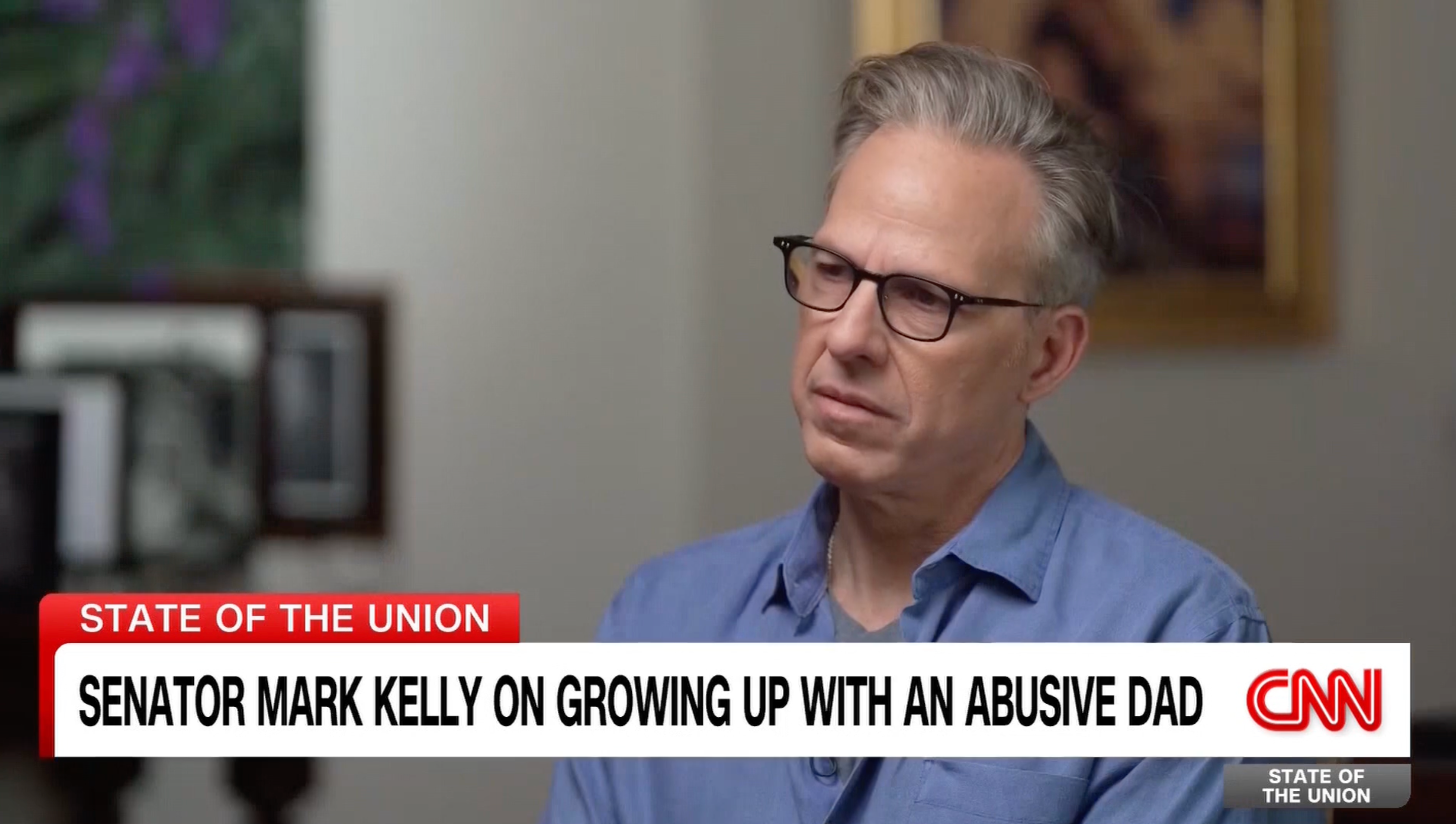 Jake Tapper appeared visibly moved by Kelly's revelations about the domestic violence he witnessed growing up in West Orange, New Jersey