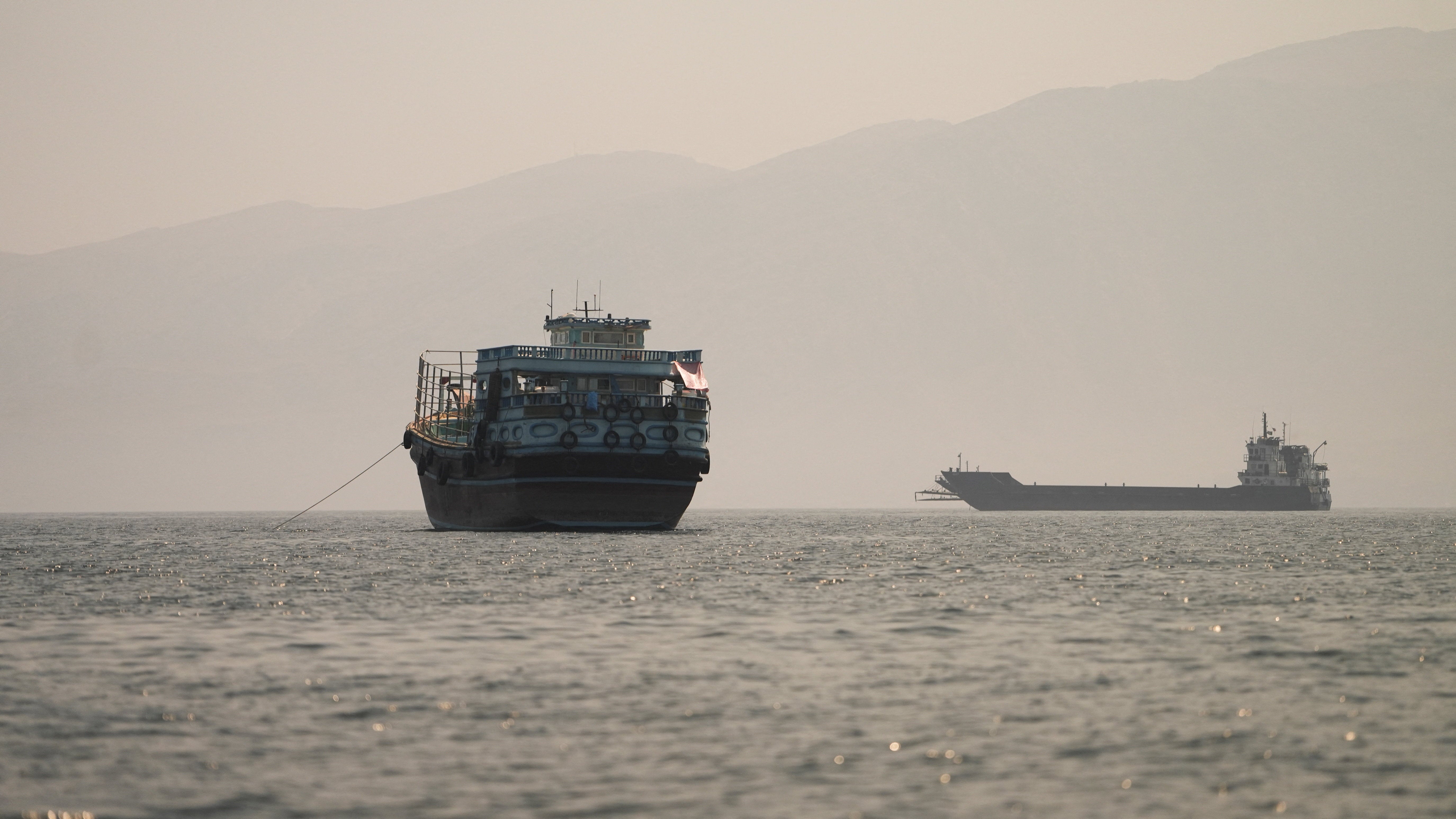 Vessels at the Strait of Hormuz, as seen from Musandam, Oman, June 22 (Reuters)
