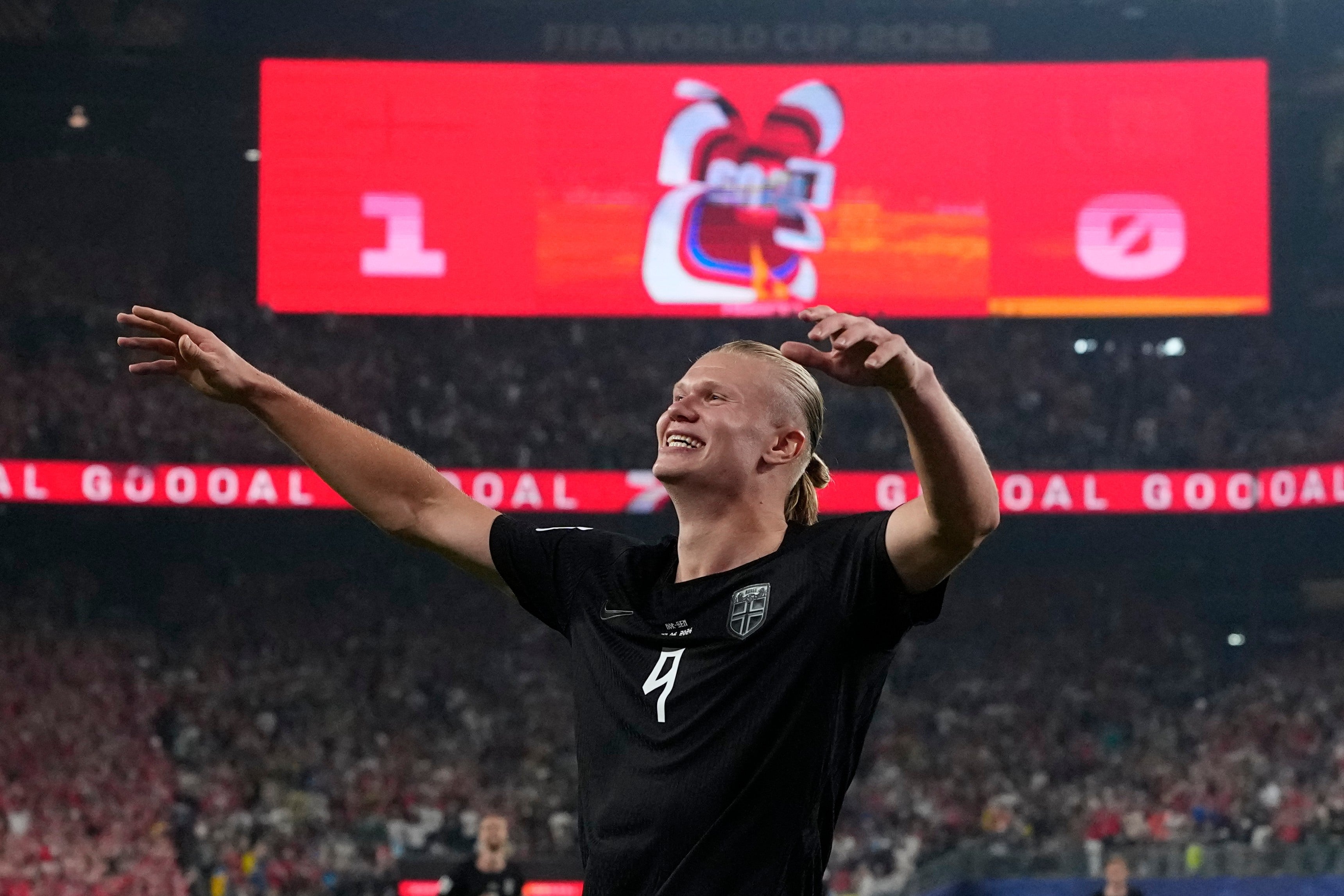 Erling Haaland celebrates scoring against Senegal at the World Cup