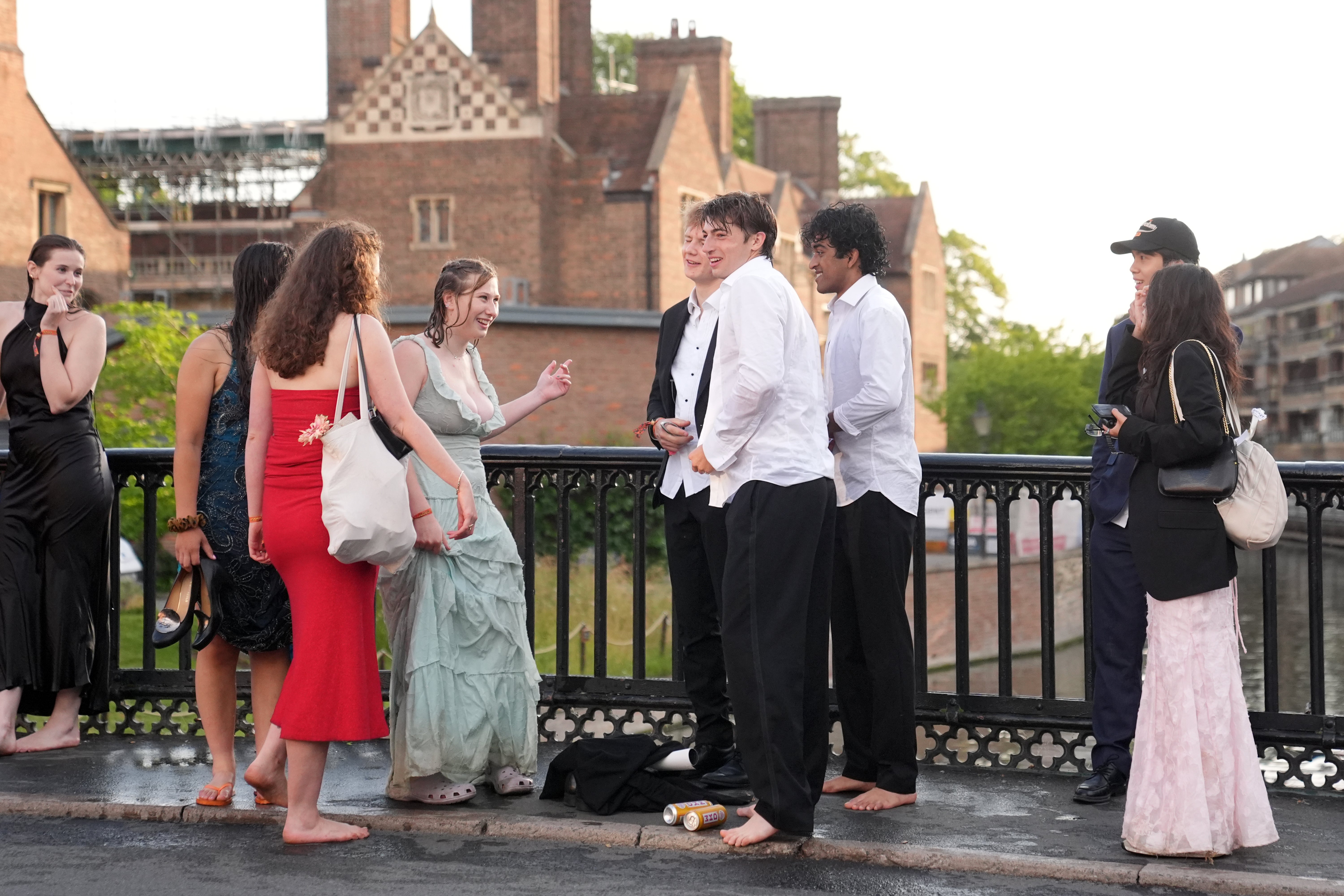 Students made their way home still in ball gowns and black tie (Joe Giddens/ PA) (PA Wire)