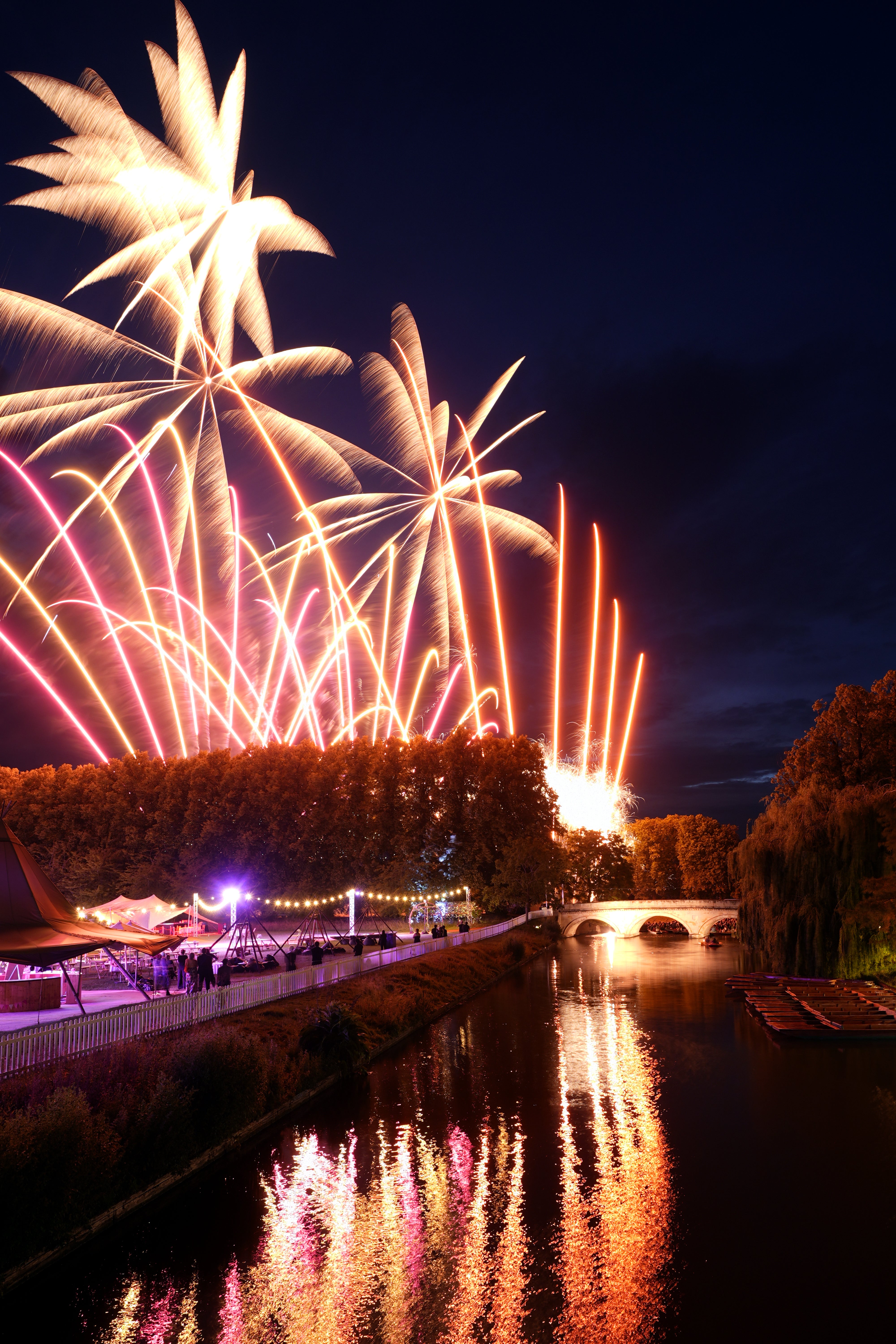 A firework display lights up the sky over the River Cam during the Trinity May Ball (Joe Giddens/ PA) (PA Wire)