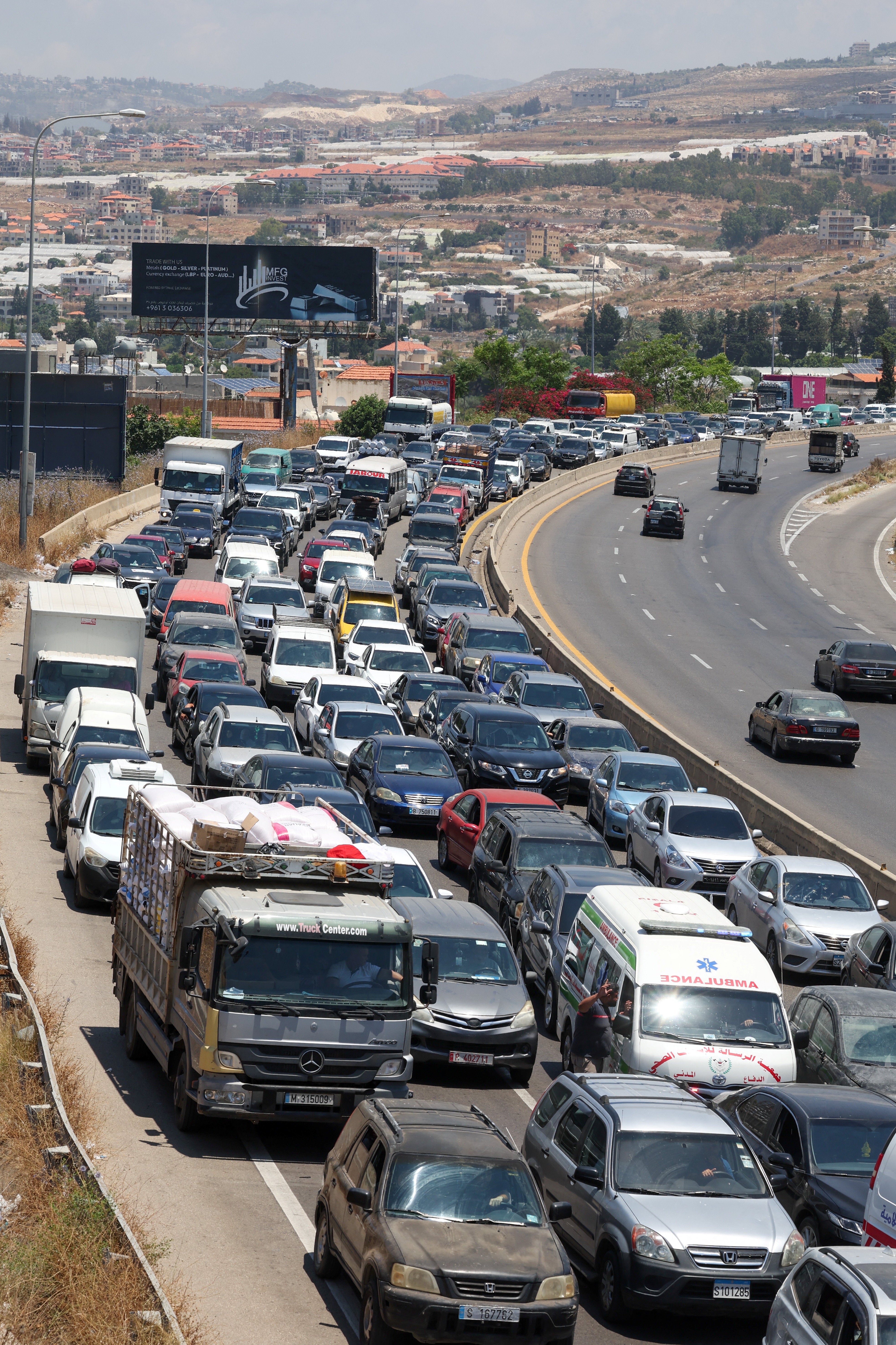 Displaced people make their way back to their homes in southern Lebanon following an interim deal between the U.S. and Iran, in Sidon (Reuters)
