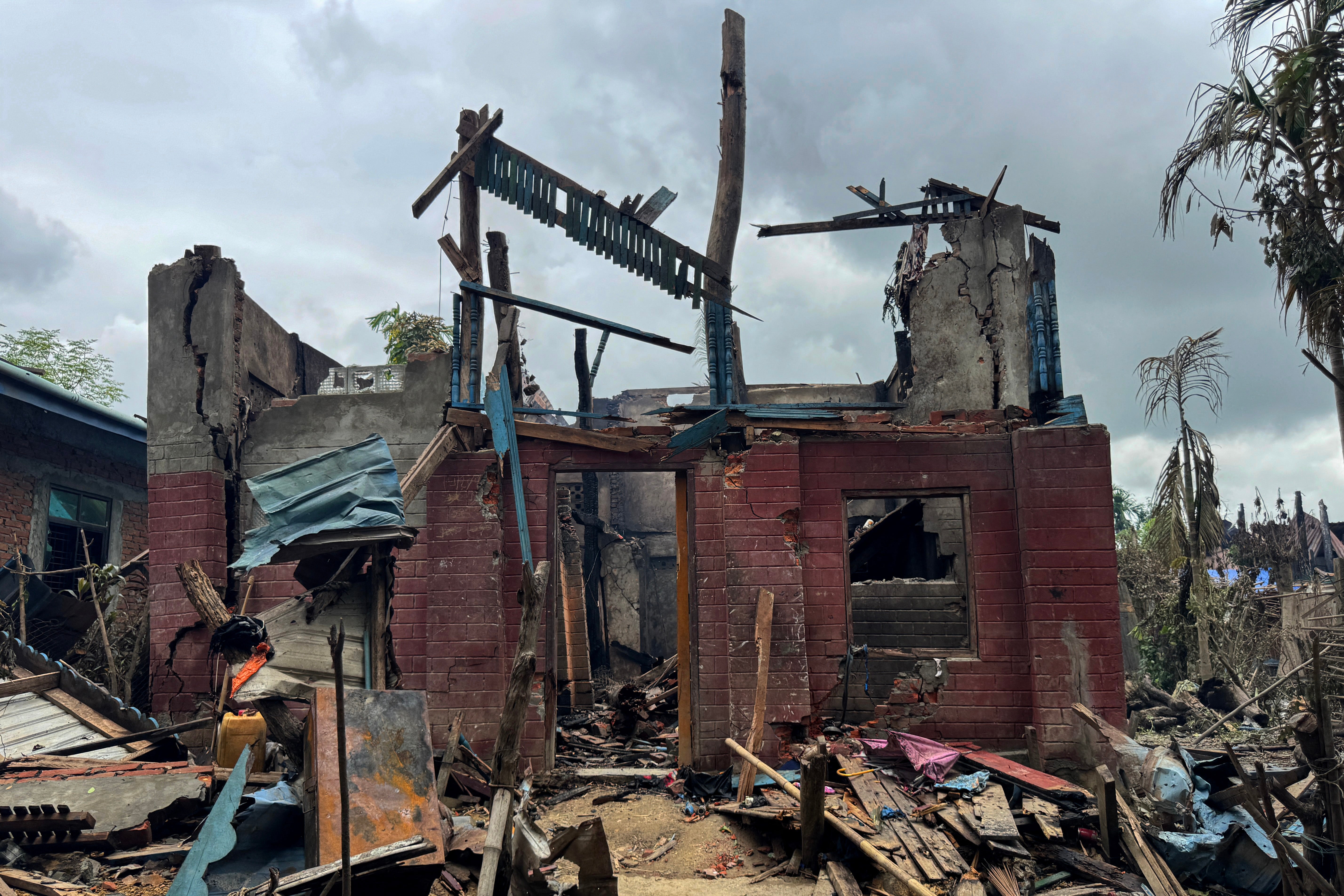 Ruins of a building after an airstrike by Myanmar's military in Kyauktaw, western Rakhine state, on 18 June 2026 (AFP/Getty)