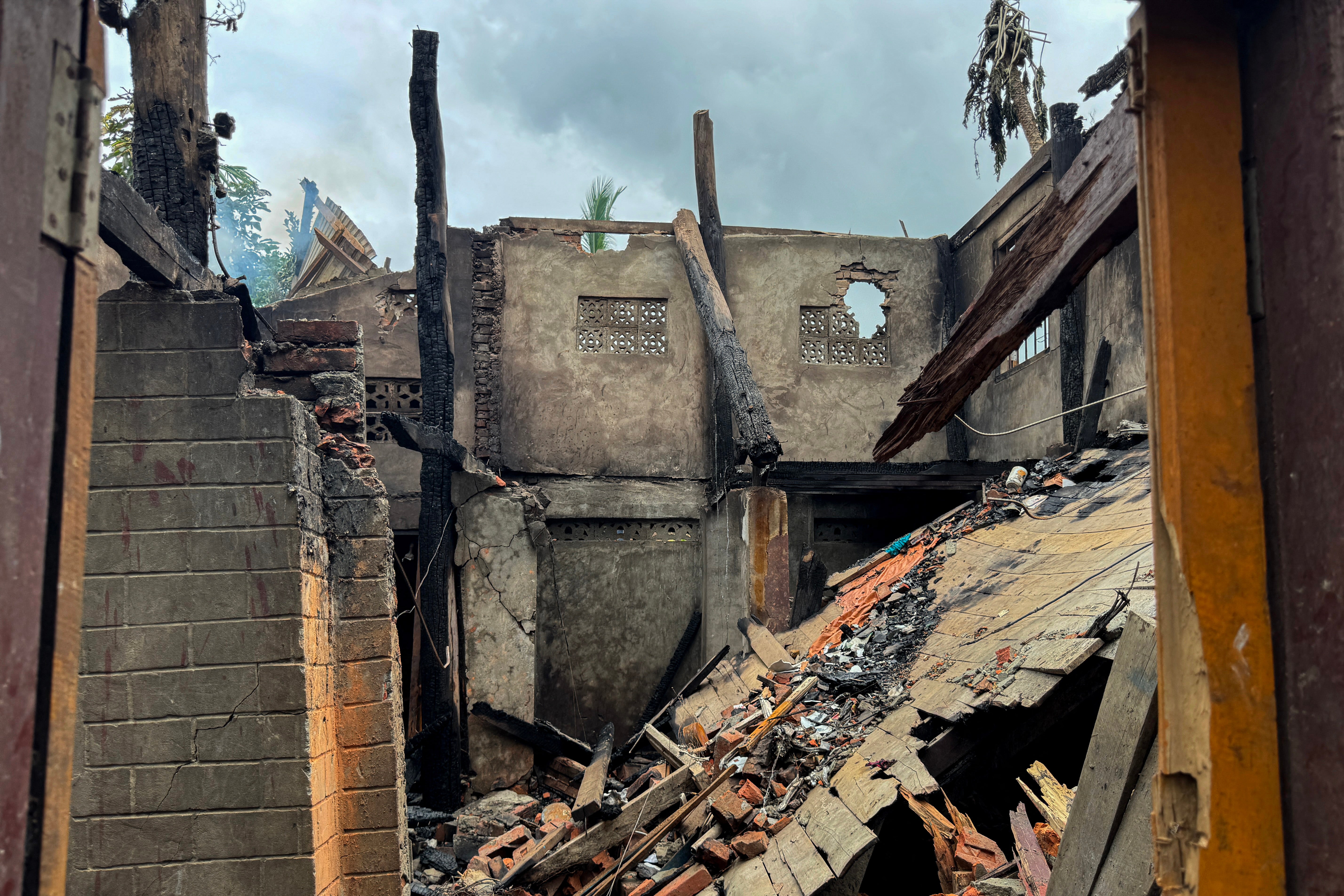 Ruins of a building after an airstrike by Myanmar's military in Kyauktaw, western Rakhine state, on 18 June 2026 (AFP/Getty)