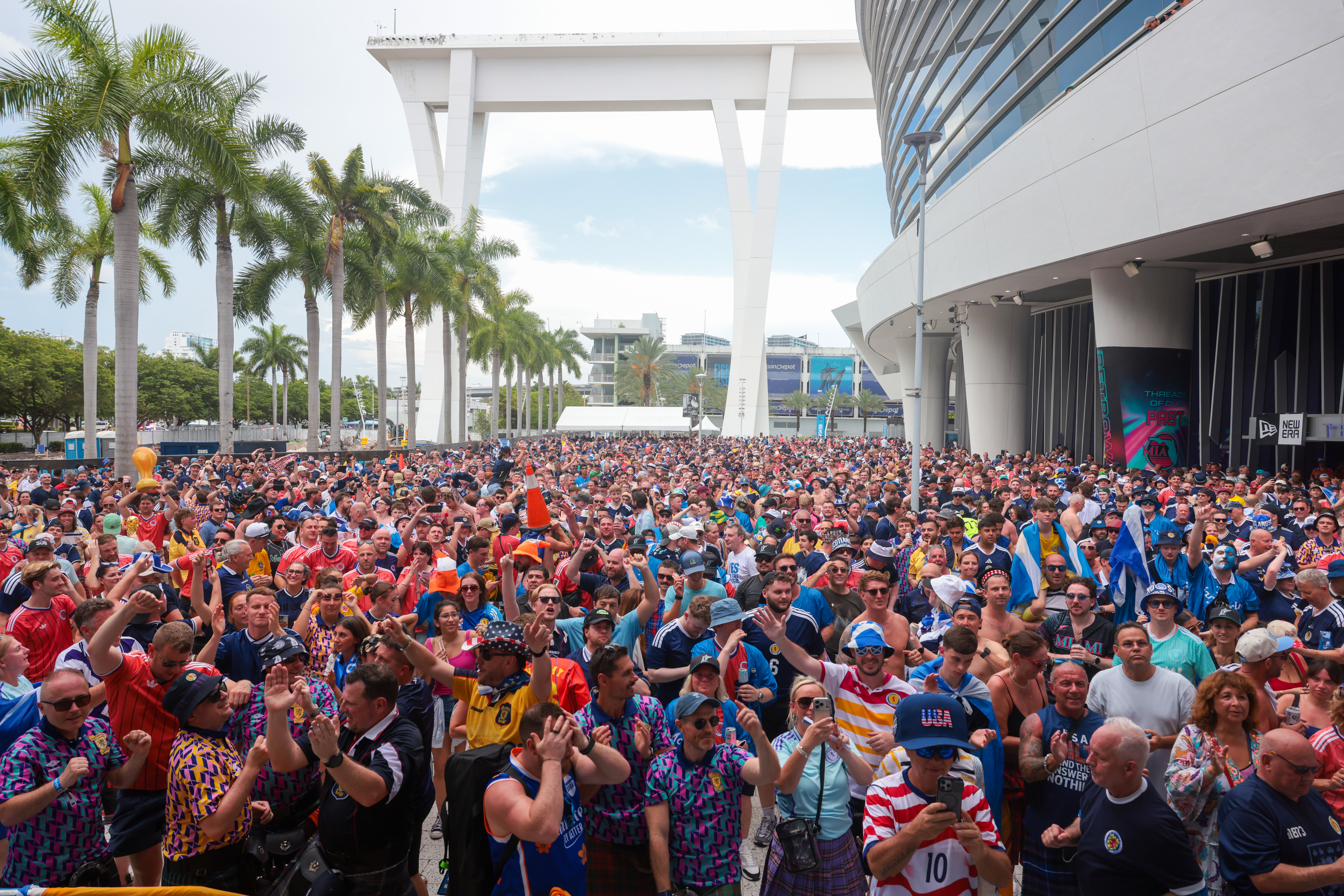 Scotland fans celebrate before the MLB game between the Texas Rangers and the Miami Marlins.