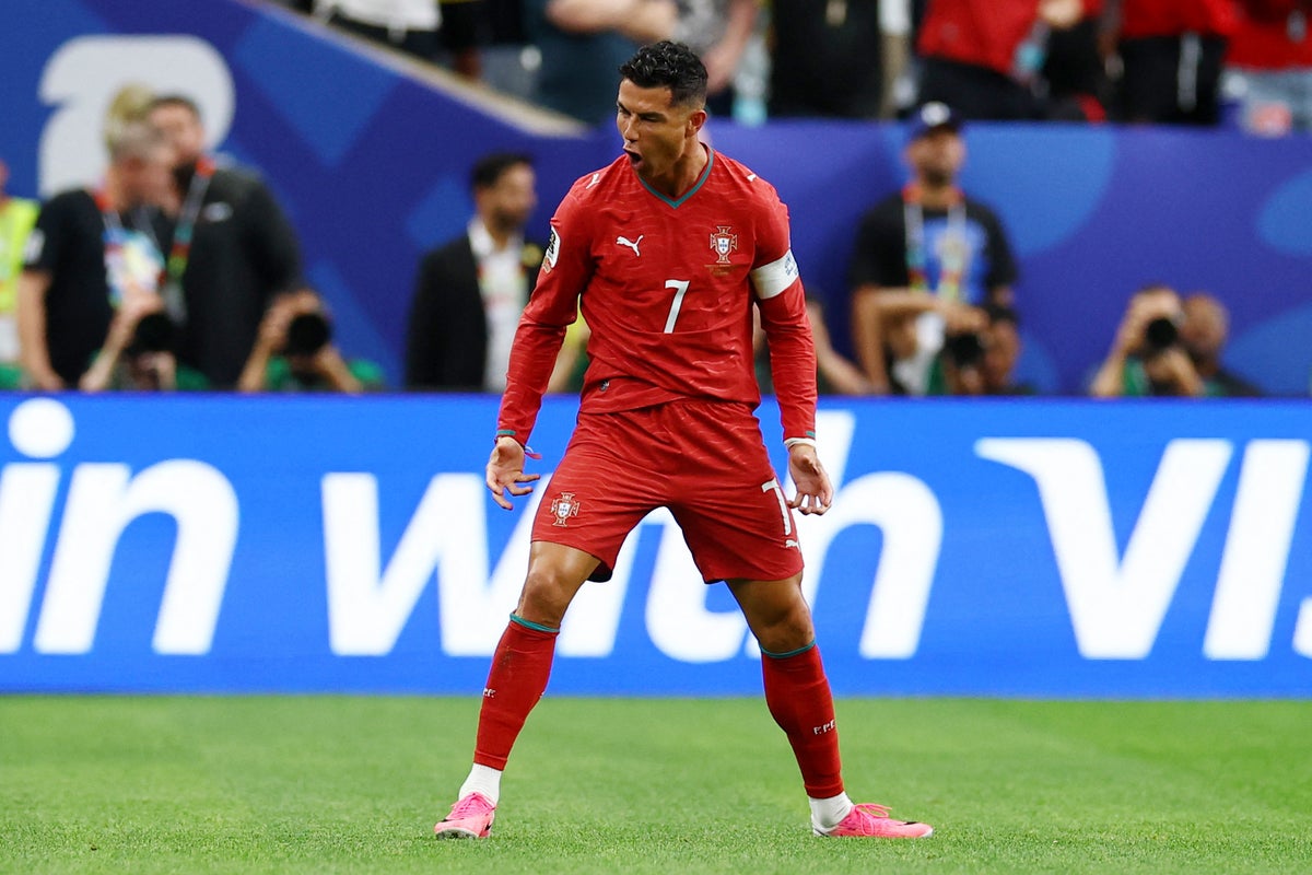 Cristiano Ronaldo mencetak gol pemecah rekor di Piala Dunia.