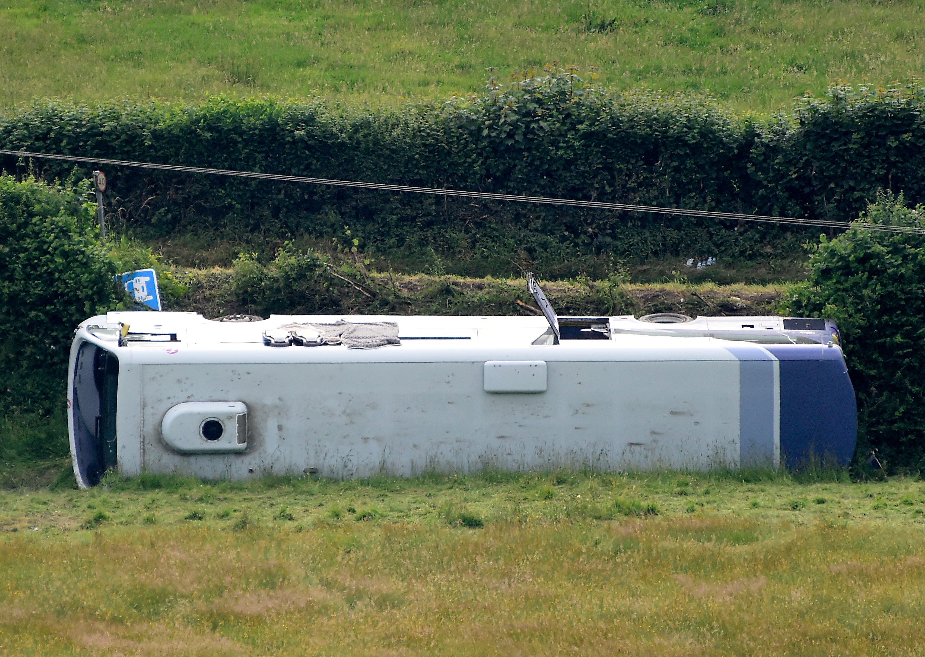 Kidwelly: Six in hospital after bus overturns during crash in Wales