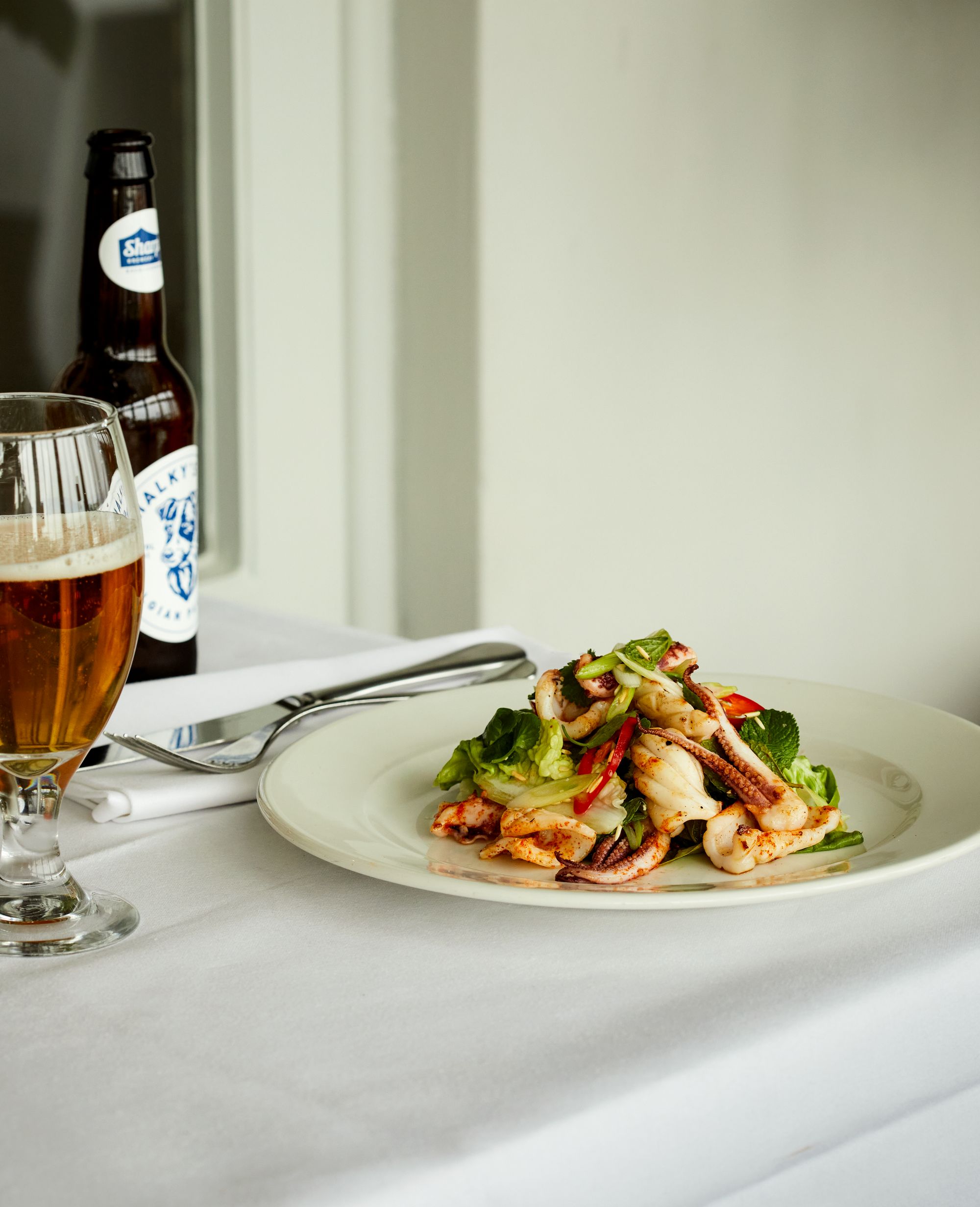 A trip to Thailand in 1986 inspired this Cornish squid dish, bringing chilli, herbs and roasted rice to Padstow long before such flavours were commonplace in Britain