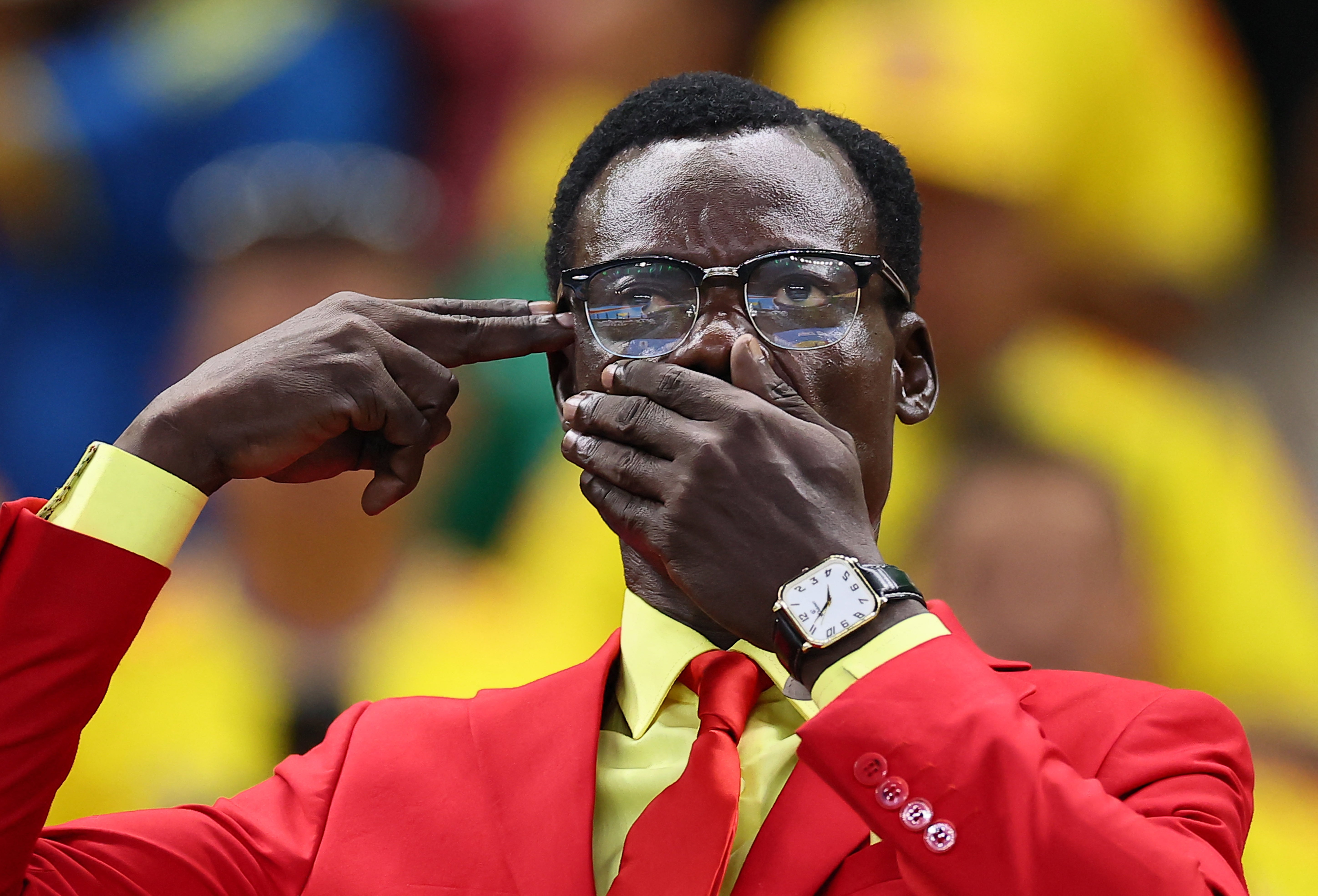 DR Congo fan Michel Nkuka Mboladinga poses before the match