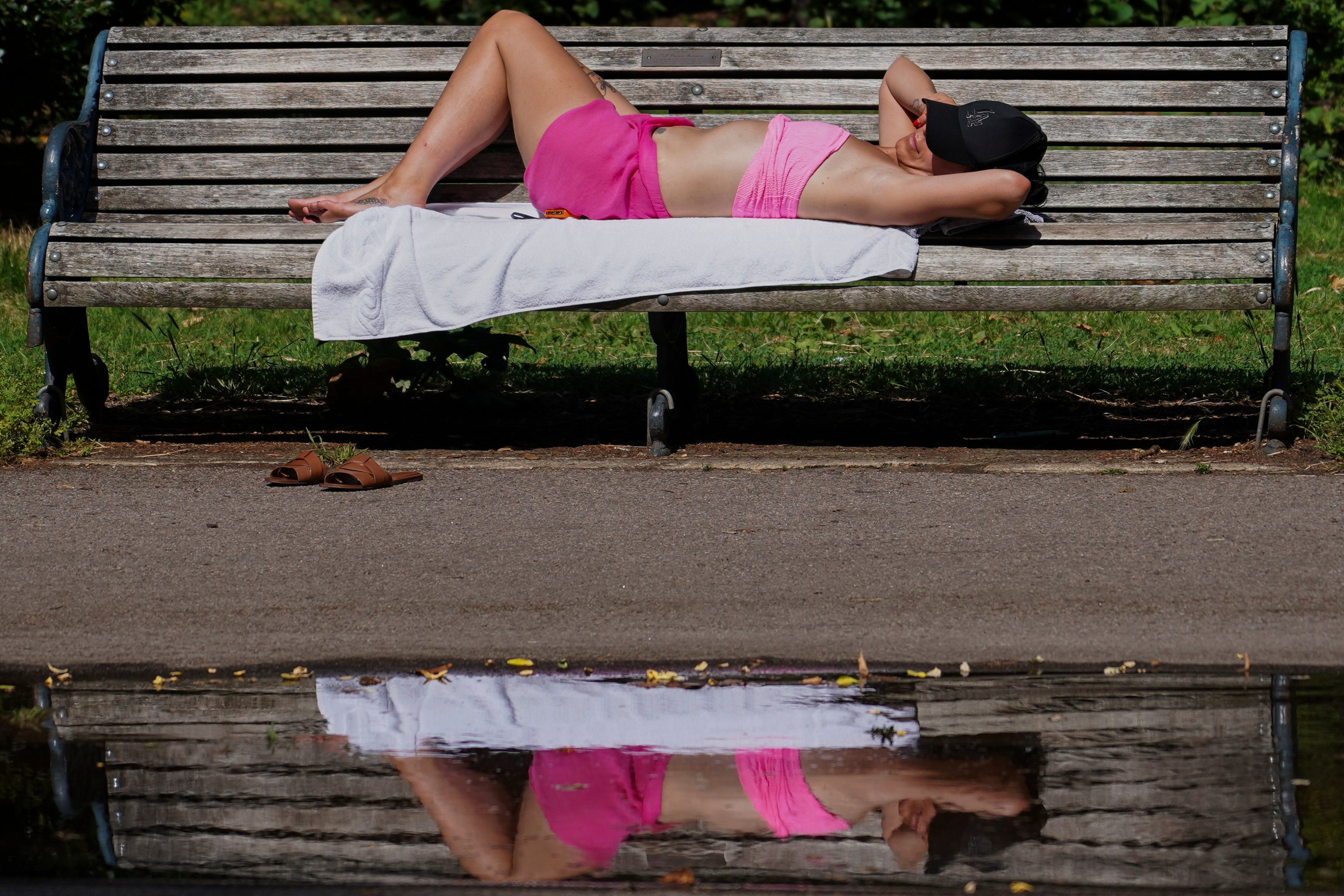 Trains cancelled and people warned to stay at home as extreme heat chaos continues