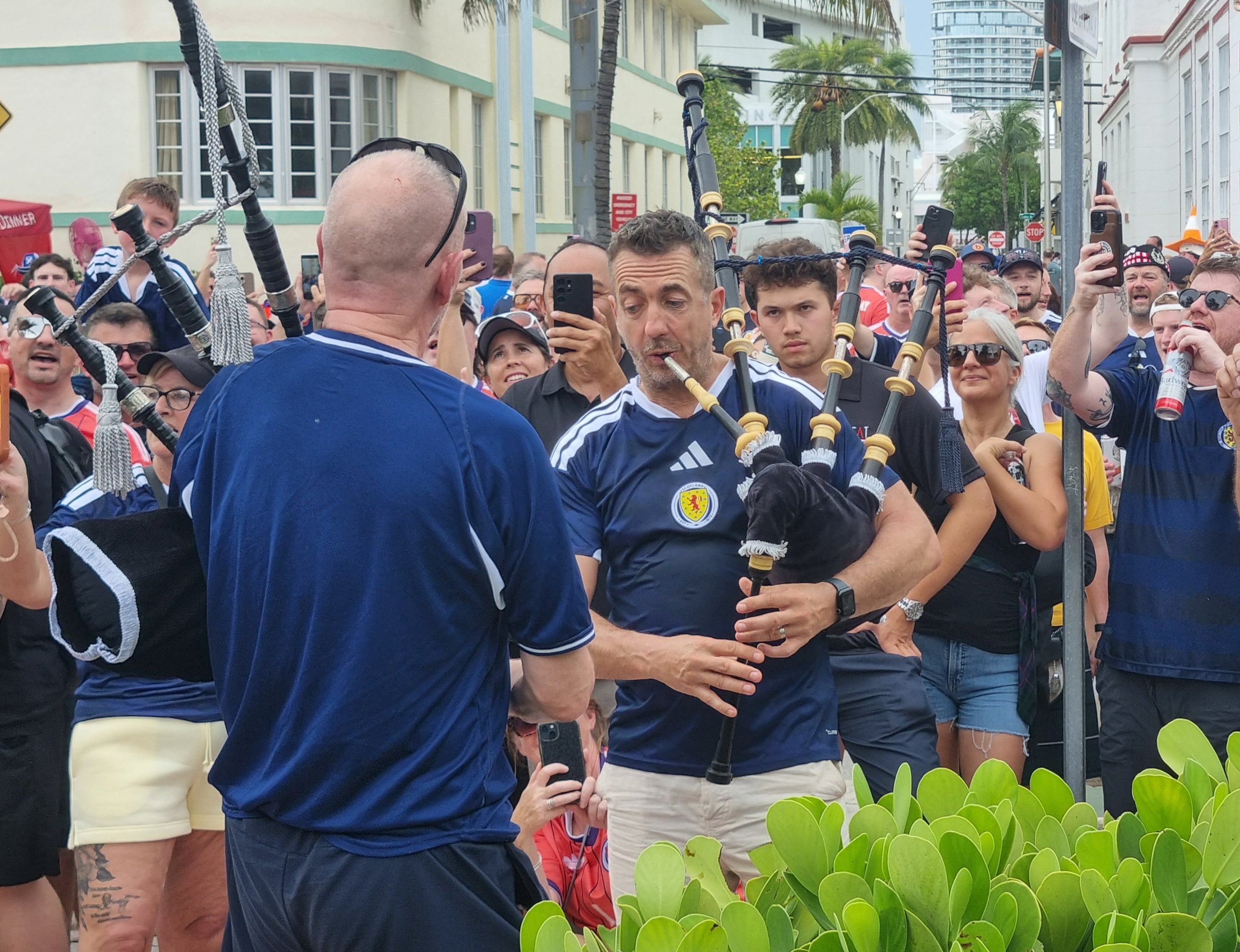 Scotland fans take part in the Tartan Army march in Miami South beach's Ocean Drive (PA)