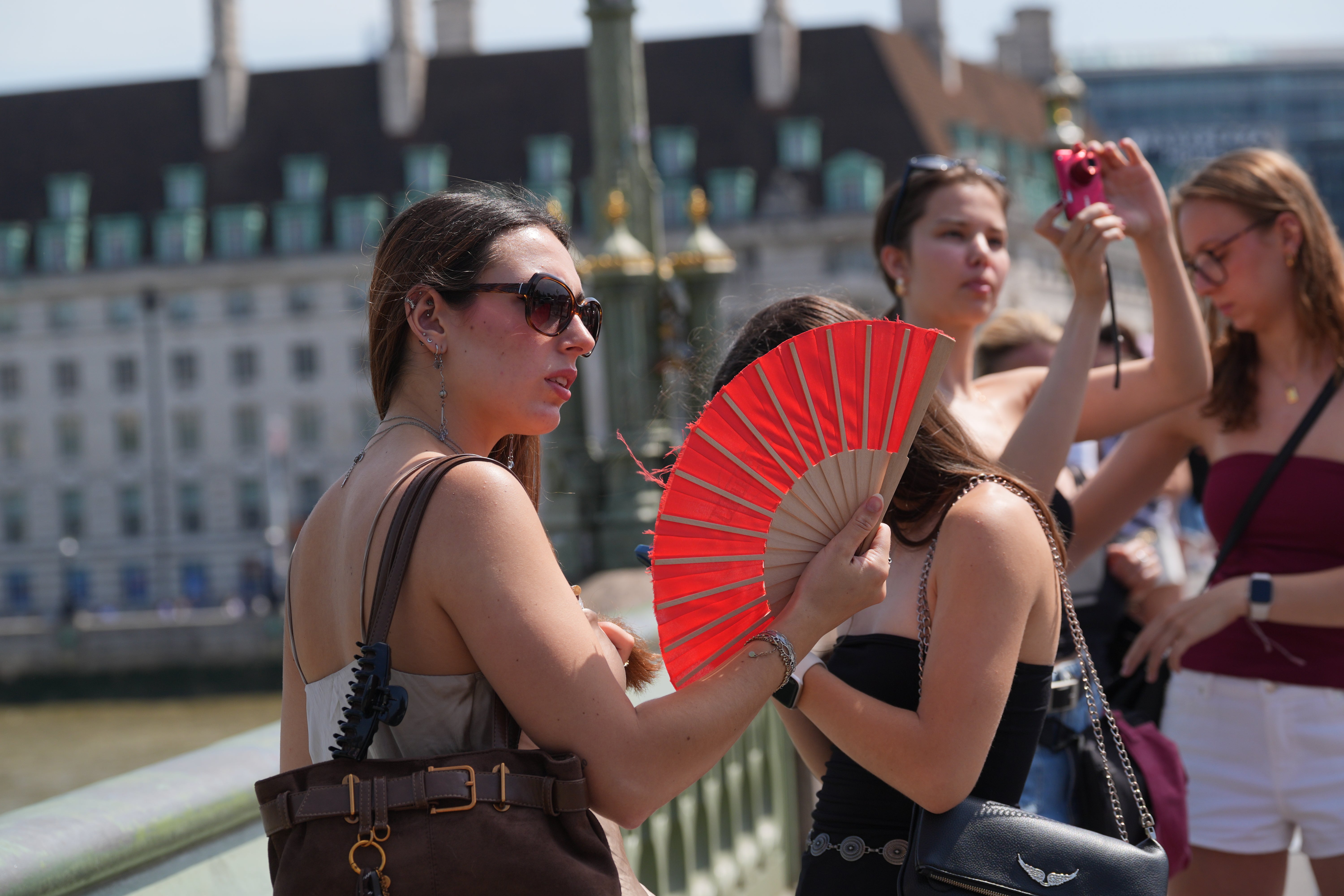 People are advised to try and keep cool as temperatures look set to hit 40C in some parts (Yui Mok/PA) (PA Wire)