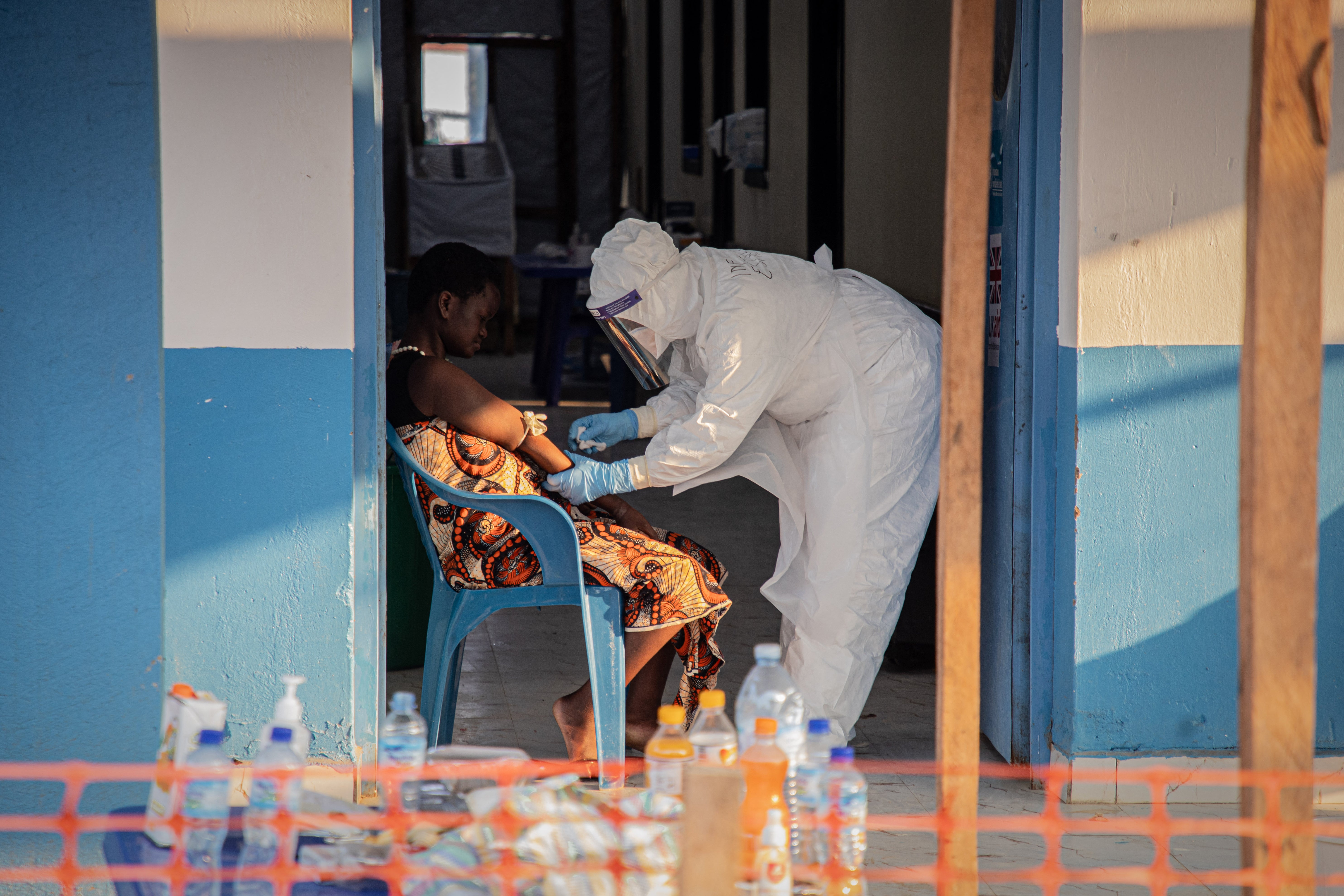 A healthcare worker at a medical centre in Bunia, DRC, on 23 June