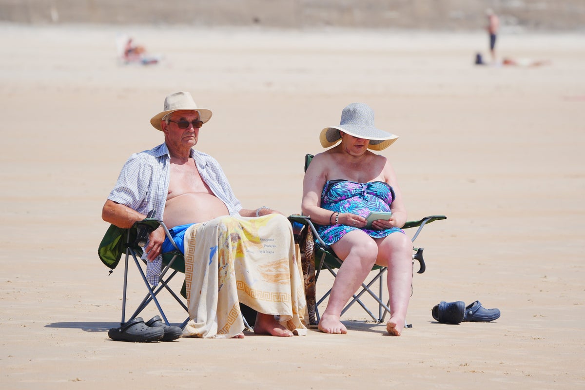 UK heatwave breaks 50-year temperature record for June