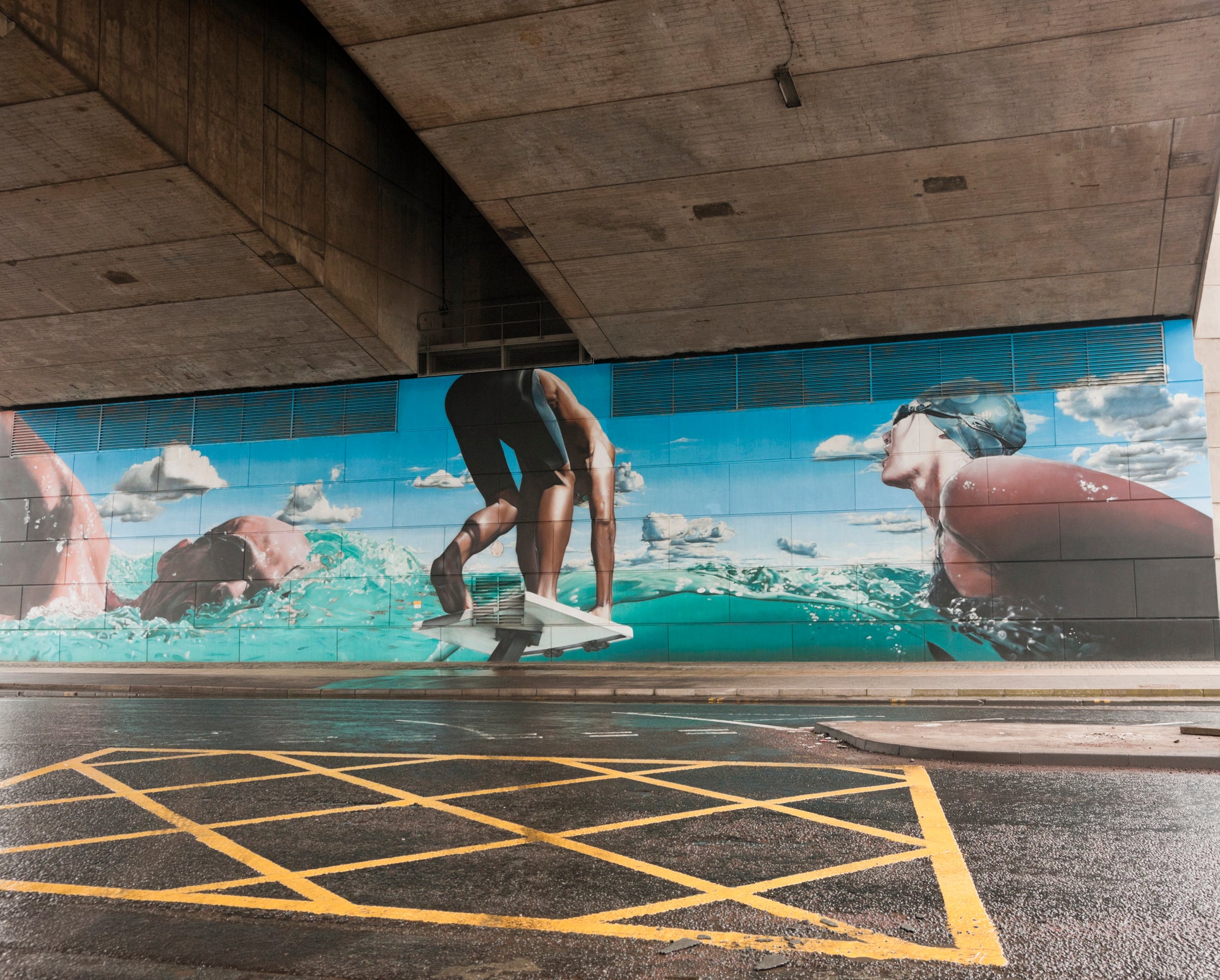 Seek out street murals in Glasgow, including this one at Springfield Quay which was painted to celebrate the Commonwealth Games in 2014