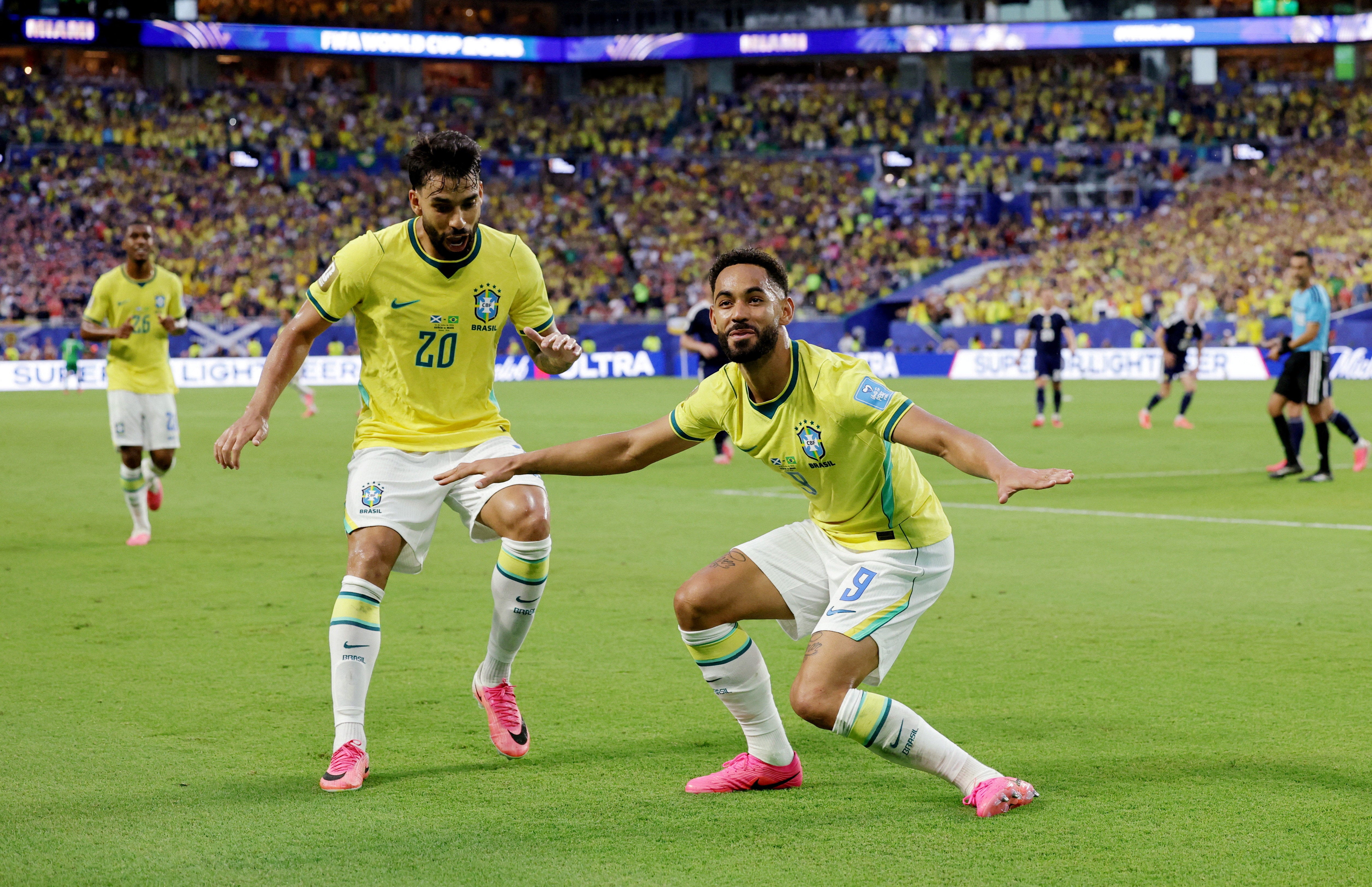 Matheus Cunha celebrates making it 3-0 to Brazil
