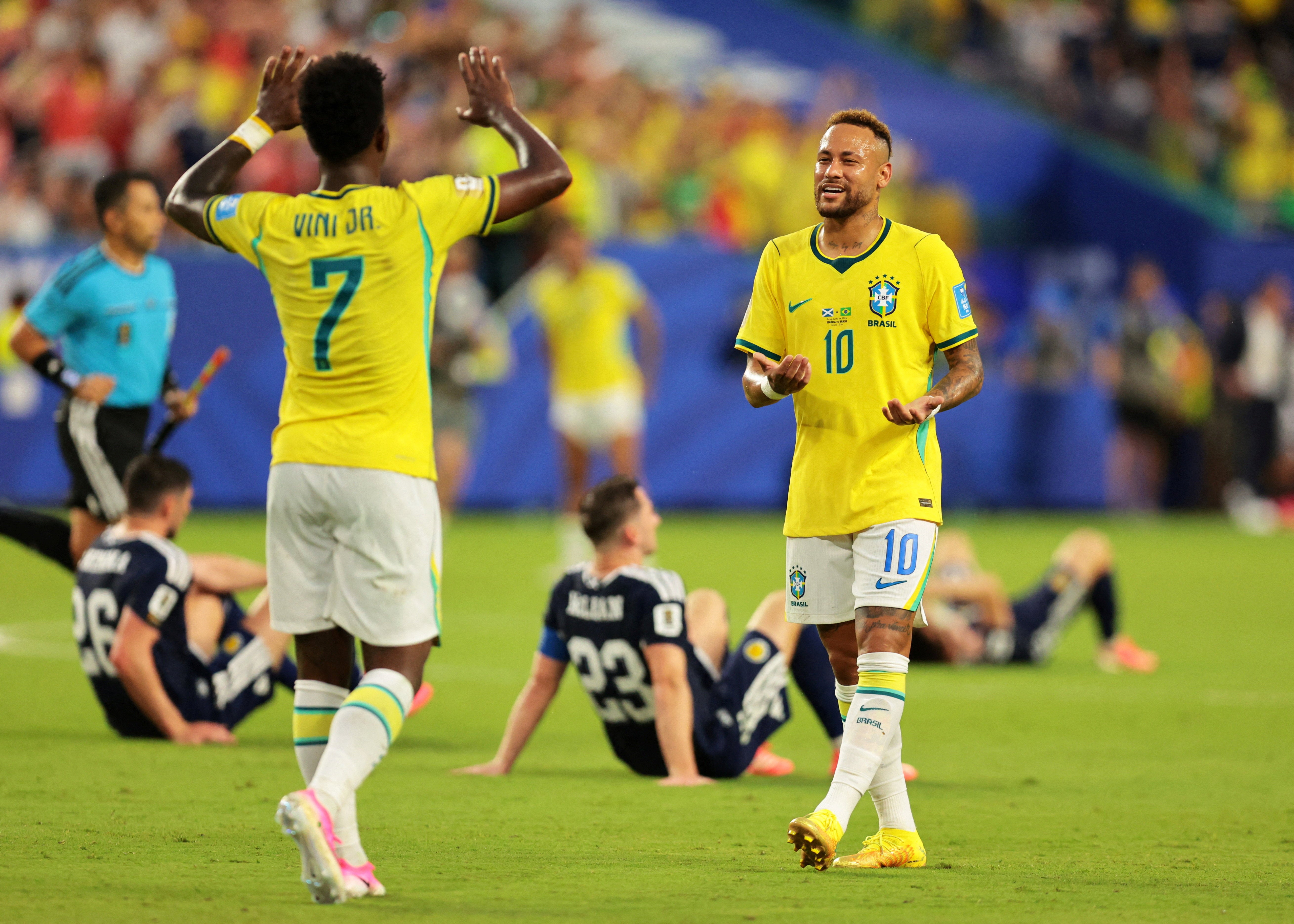 Neymar and Vinicius Jr celebrate against Scotland