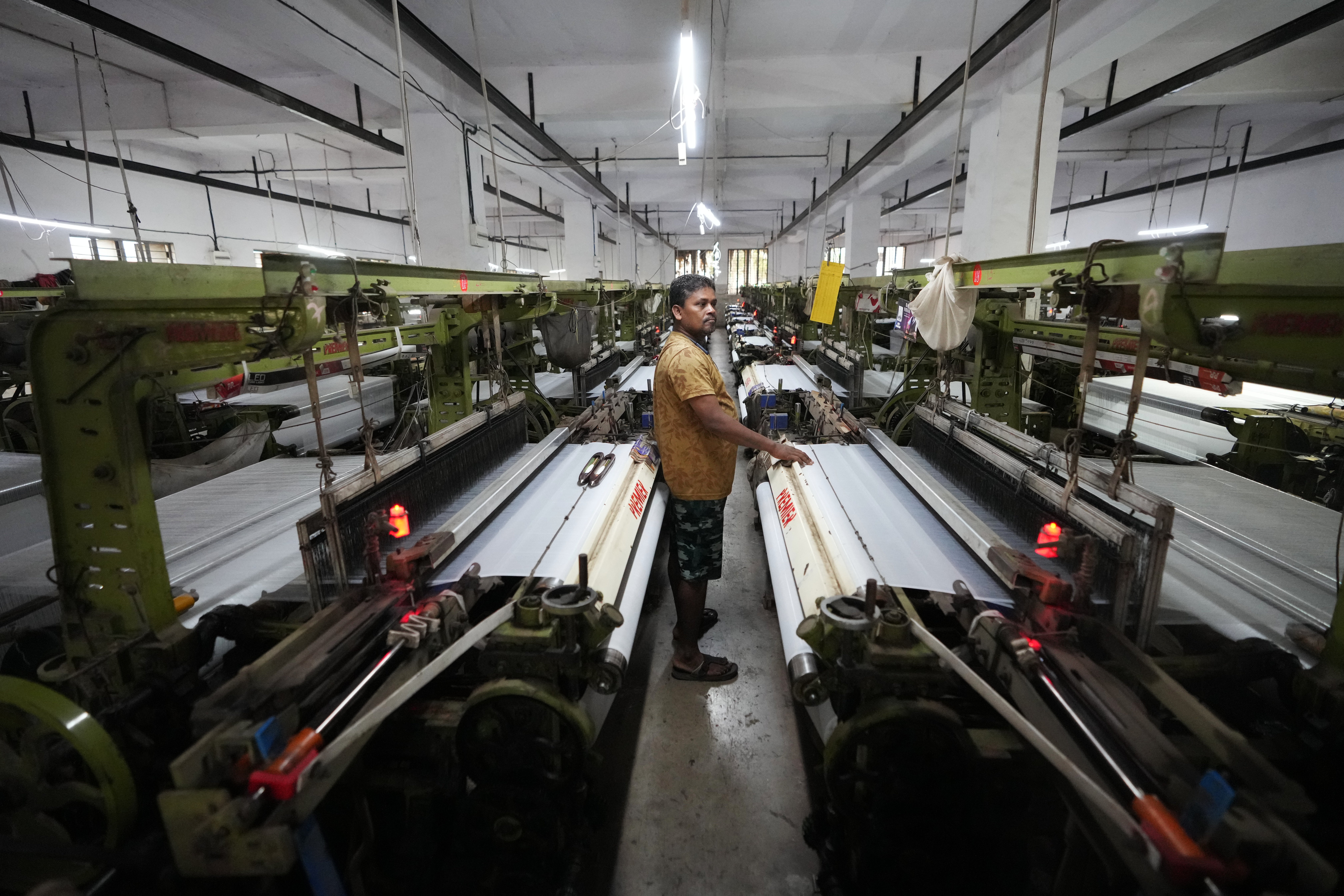 independent.co.uk - Sibi Arasu - How one Indian textile worker copes with extreme heat in factory work and cramped living quarters
